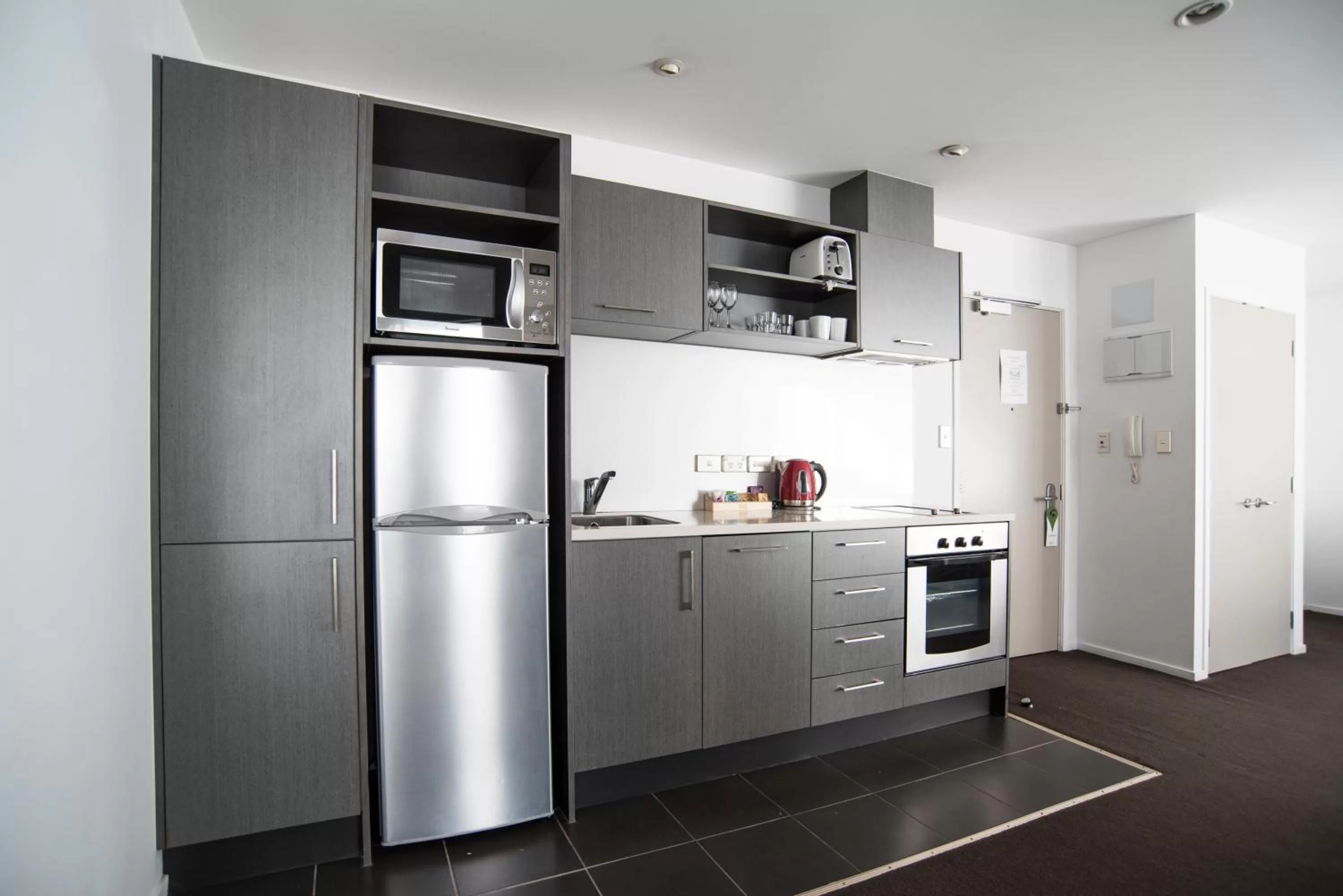 Kitchen or kitchenette in Barclay Suites