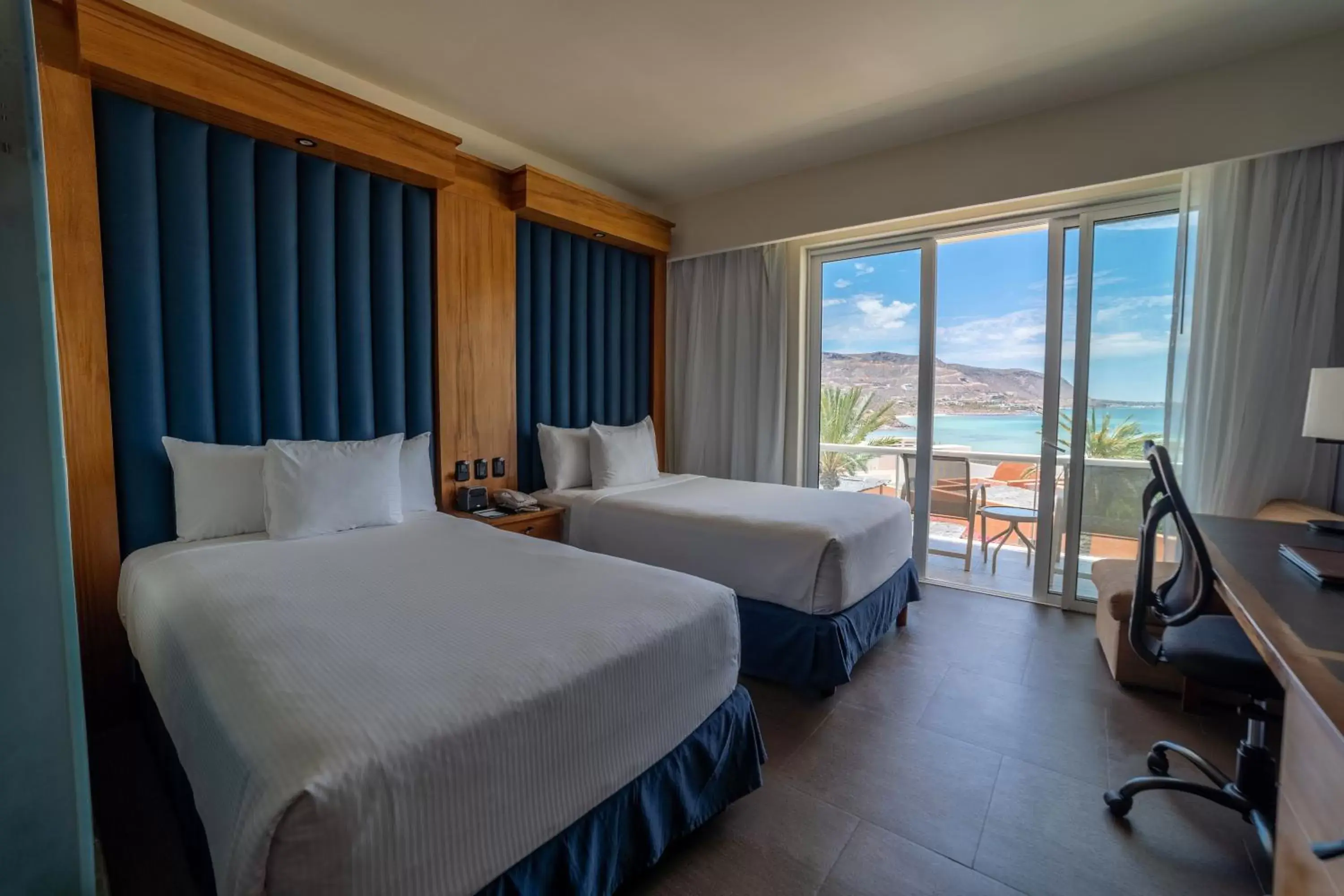 Bed in Costa Baja Resort & Spa