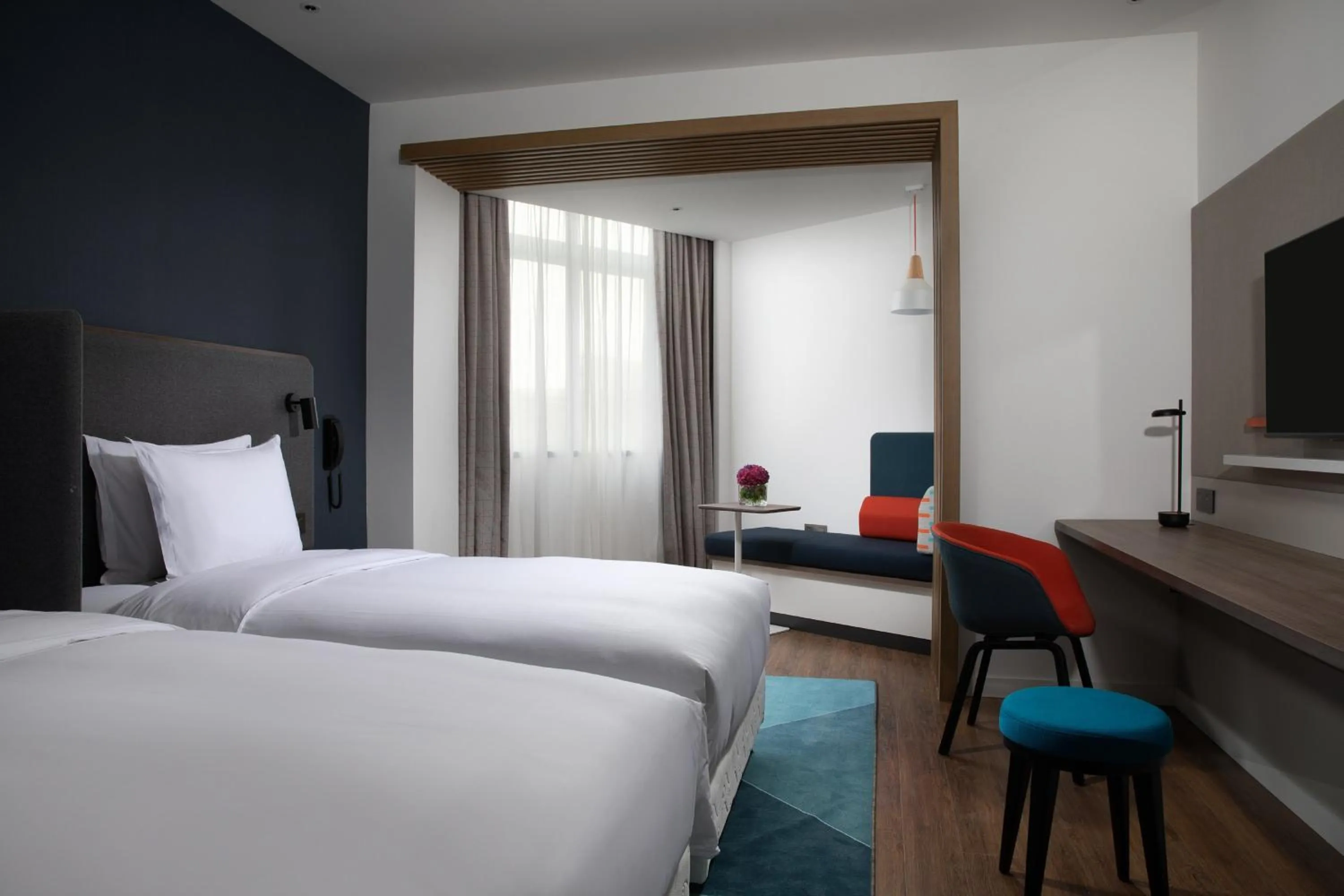 Photo of the whole room, Bed in Holiday Inn Express Chengdu Longquanyi North by IHG