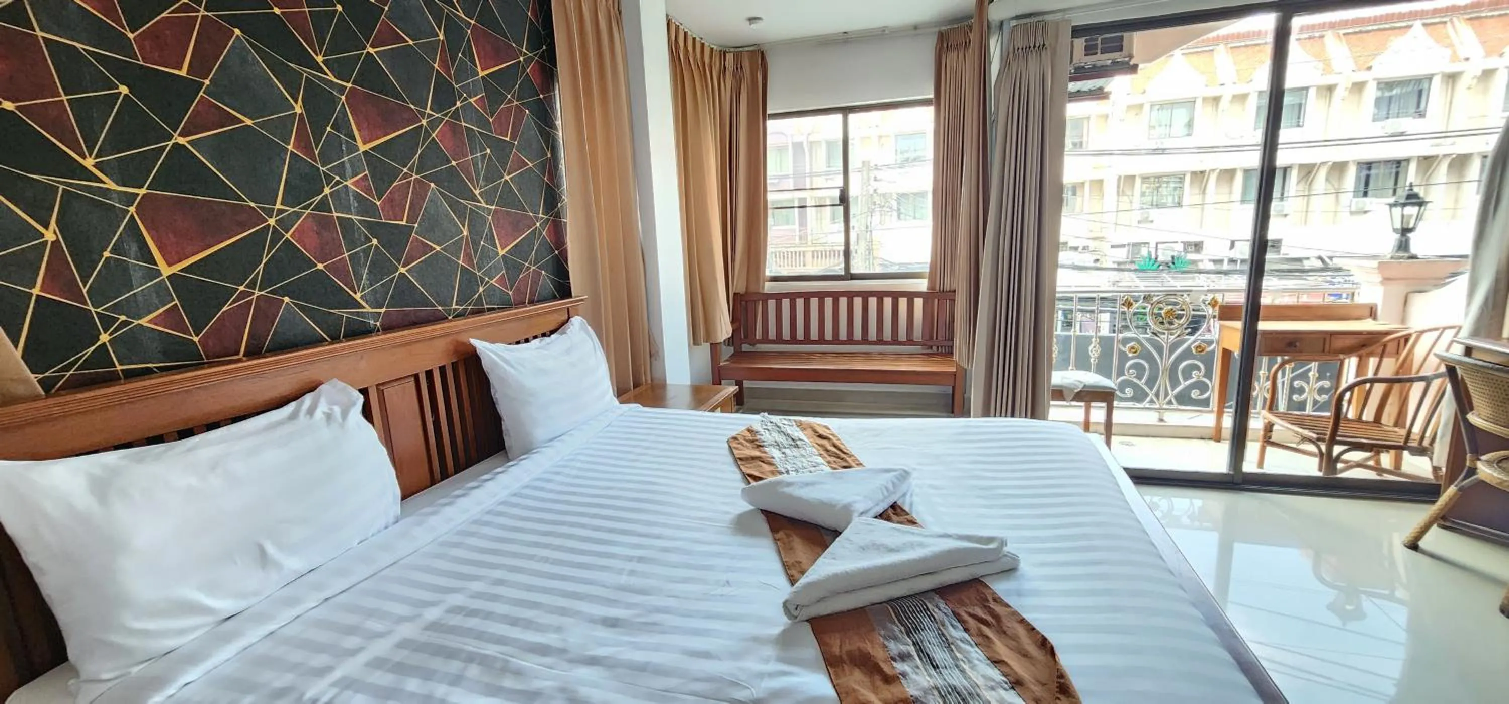 Bed in Royal Sweet Hotel