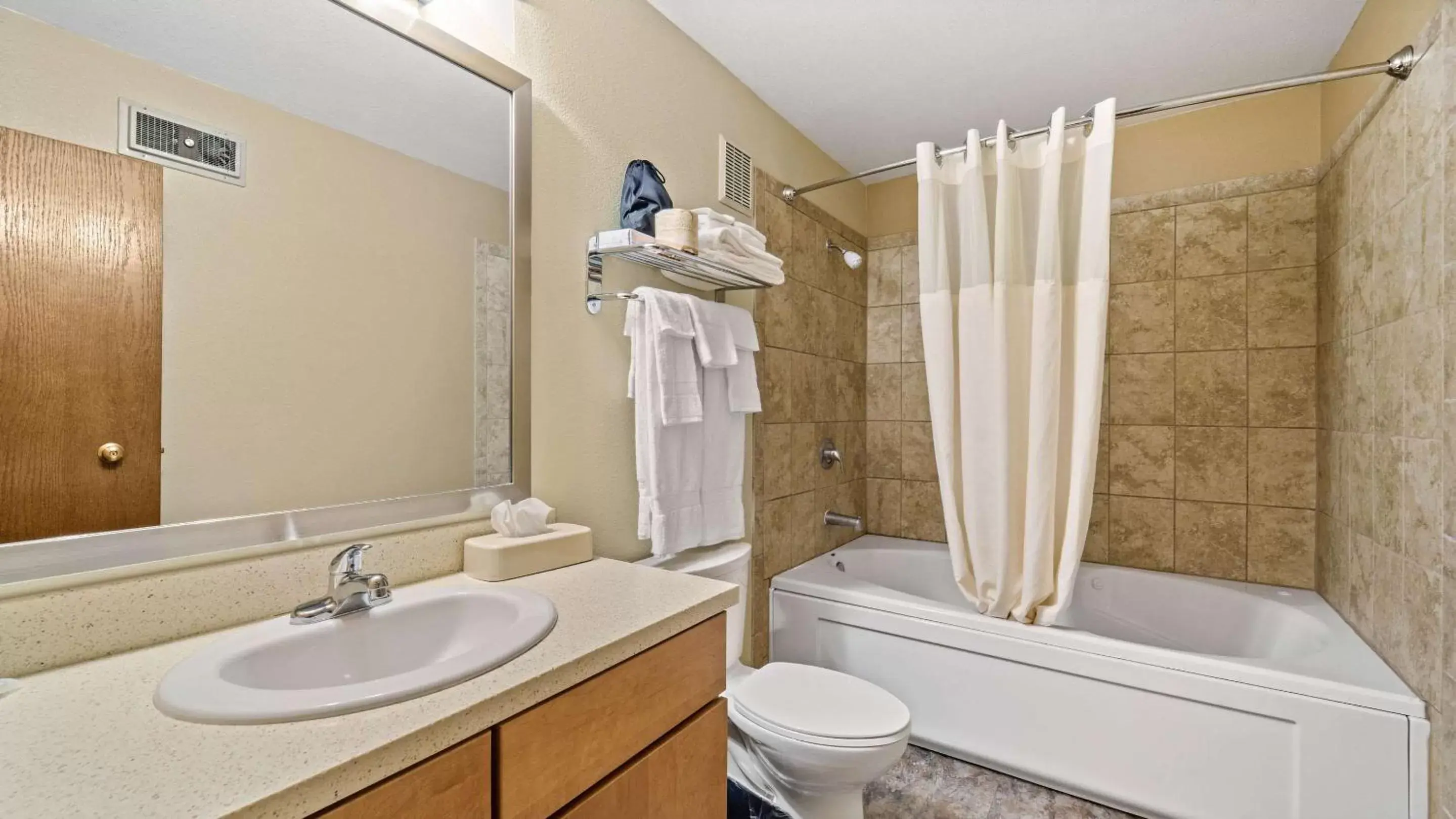 Bedroom, Bathroom in Clarion Hotel & Suites Fairbanks near Ft. Wainwright
