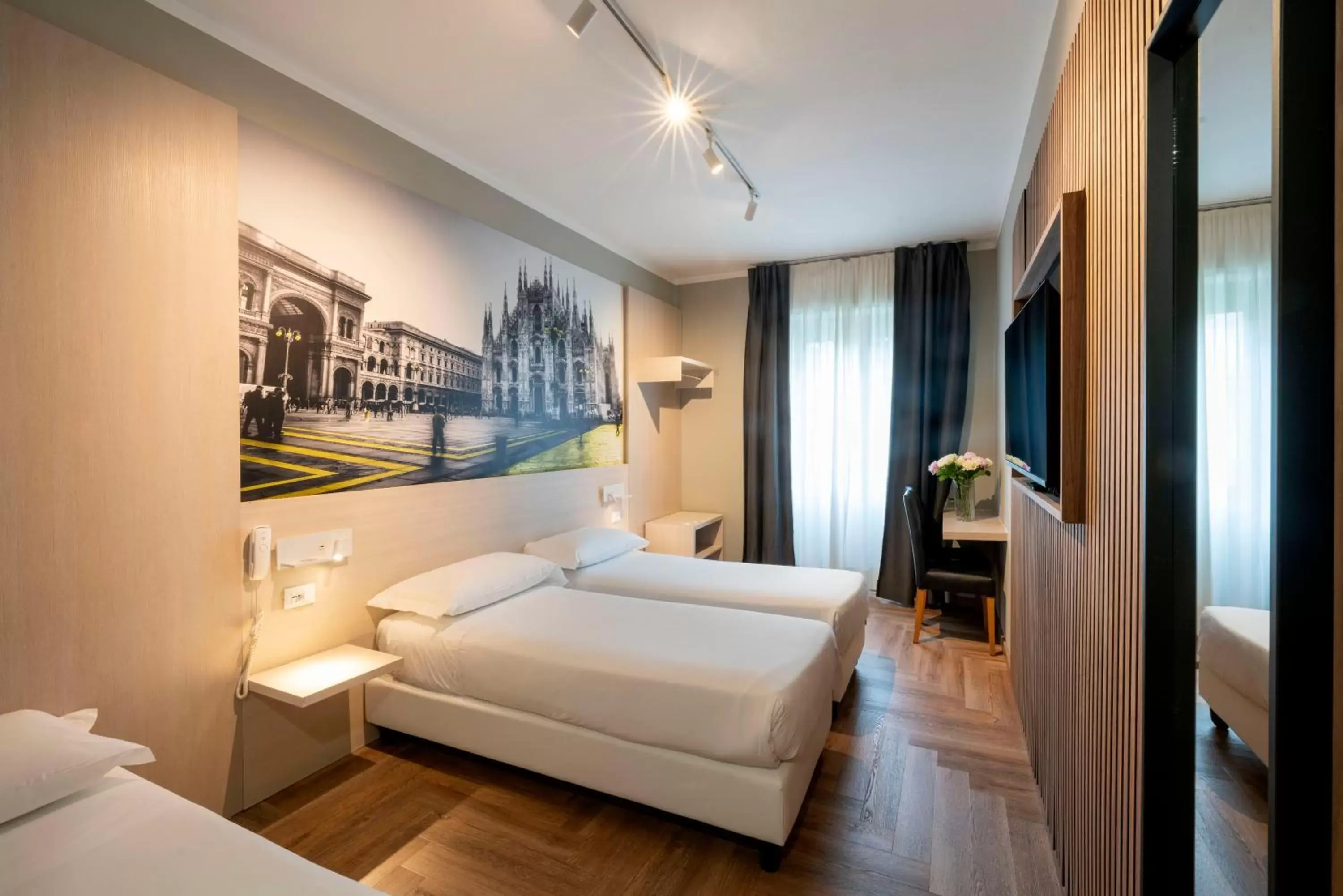 Bed in Kleos Hotel Milano