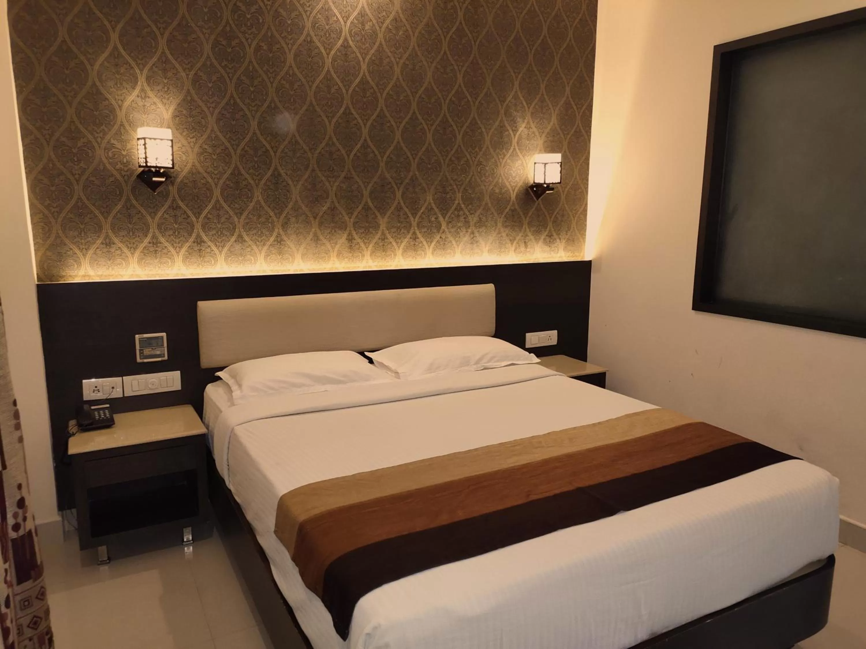Bed in Hotel Deepam
