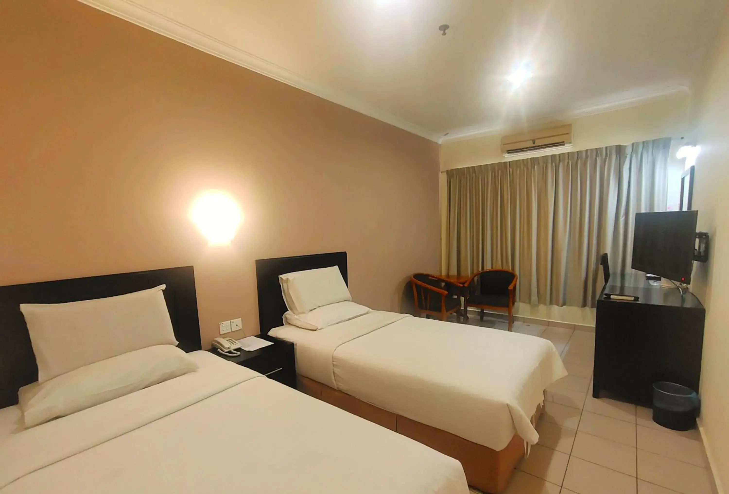 Bed in Megah D'Aru Hotel