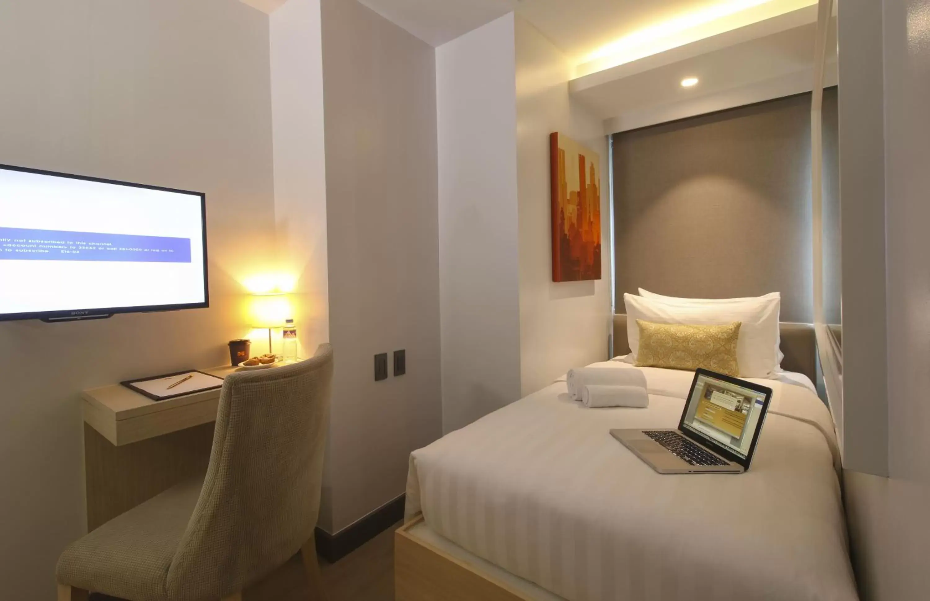 Bedroom, Bed in The Mini Suites - Eton Tower Makati