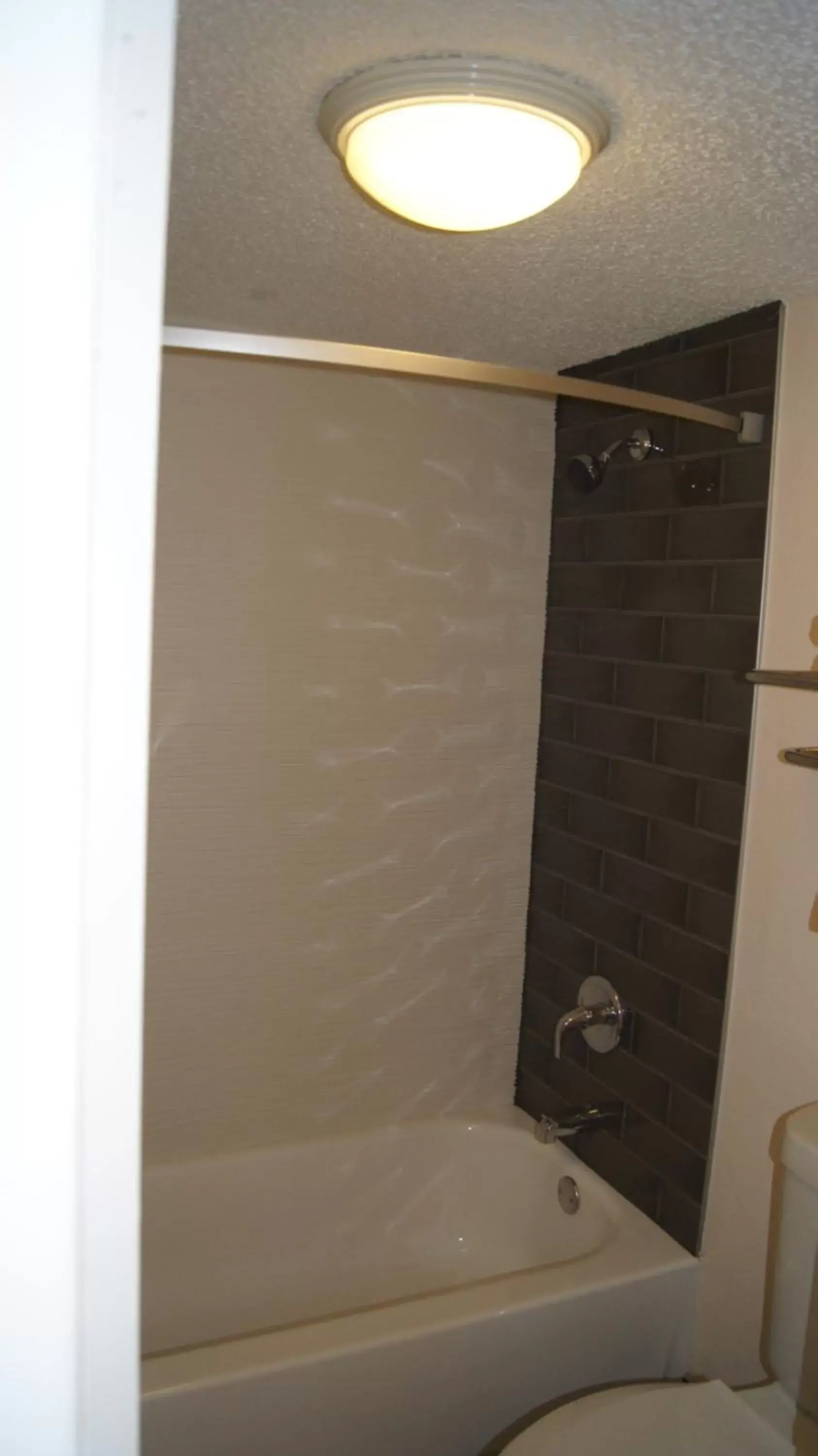 Shower, Bathroom in Travelodge by Wyndham North Richland Hills/Dallas/Ft Worth