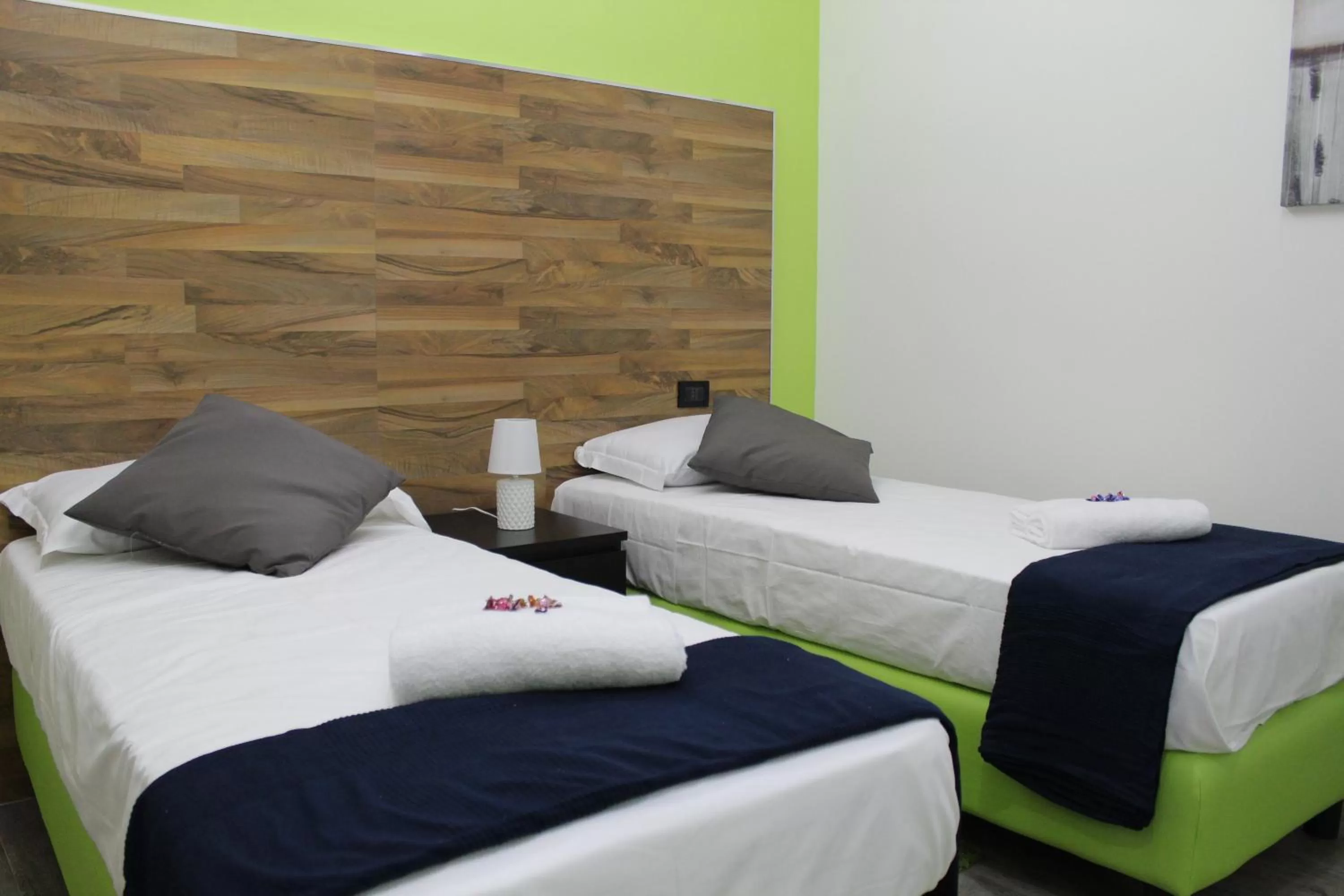 Bed in Royalty Rooms & Spa