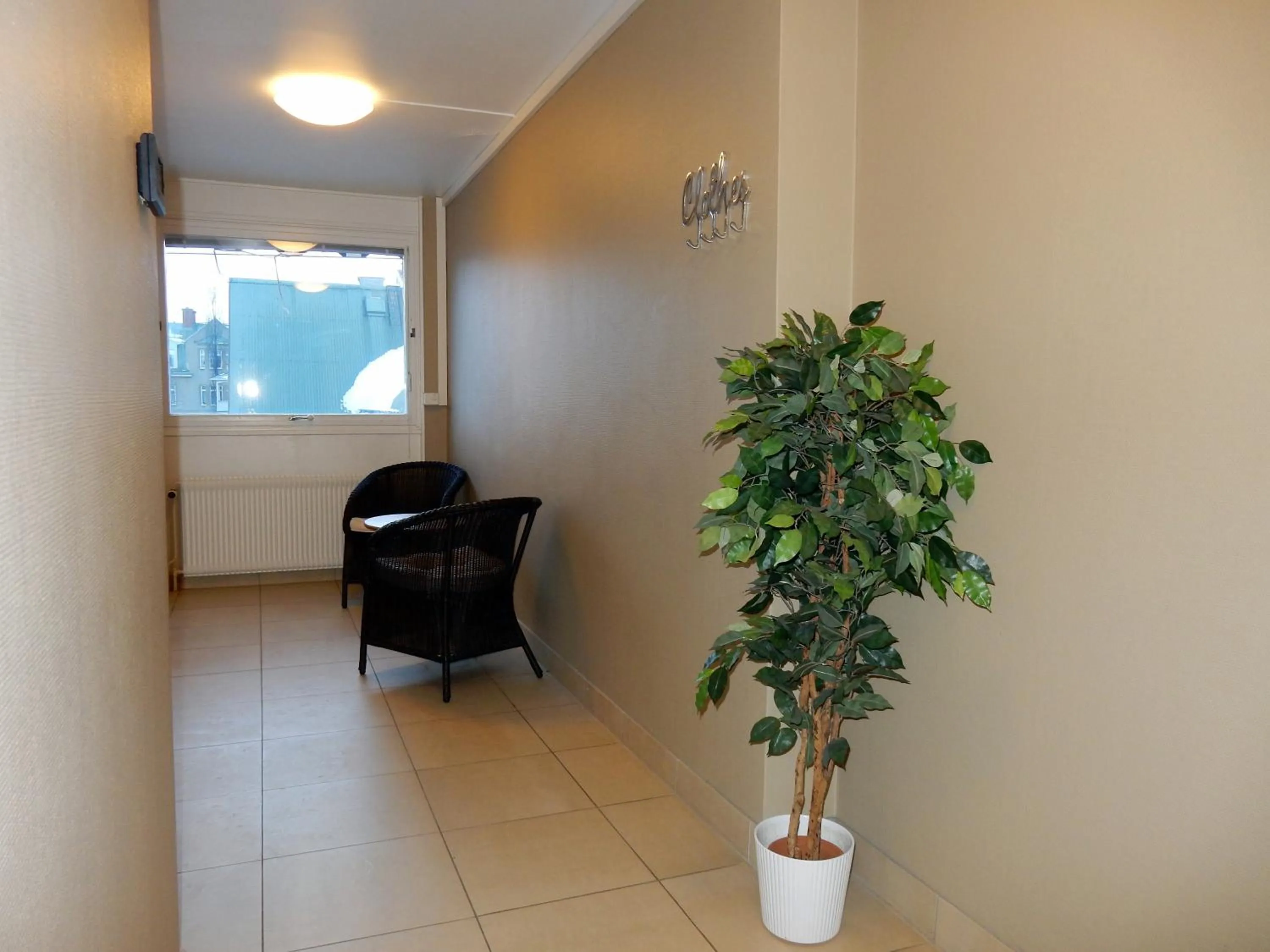 Communal lounge/ TV room in Grand Hotell Bollnäs