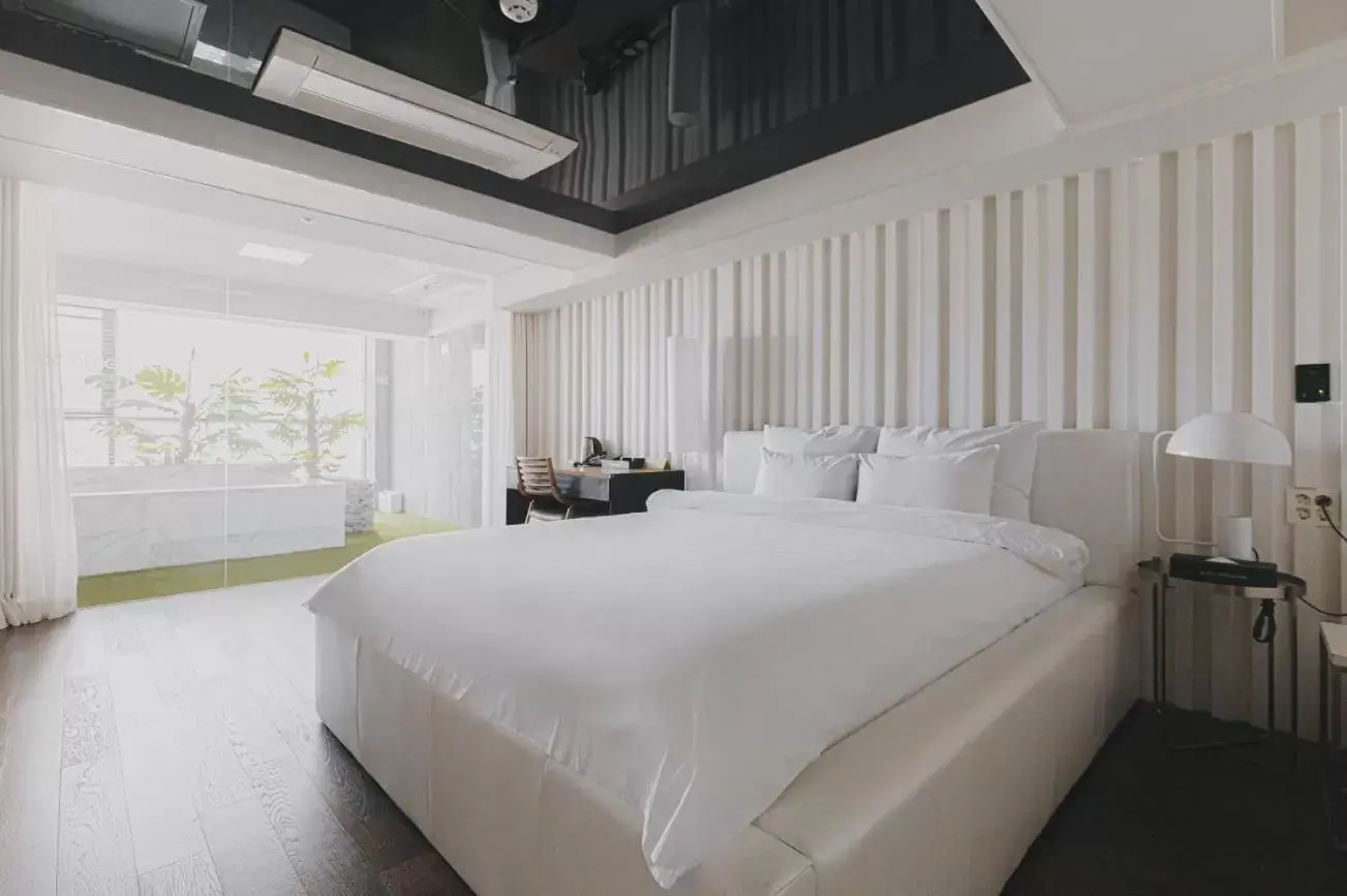 Bed in ACC Design Hotel