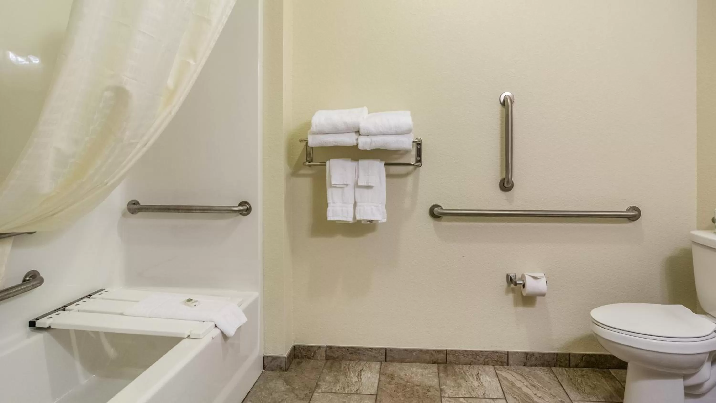 Toilet in Cobblestone Hotel & Suites - Greenville