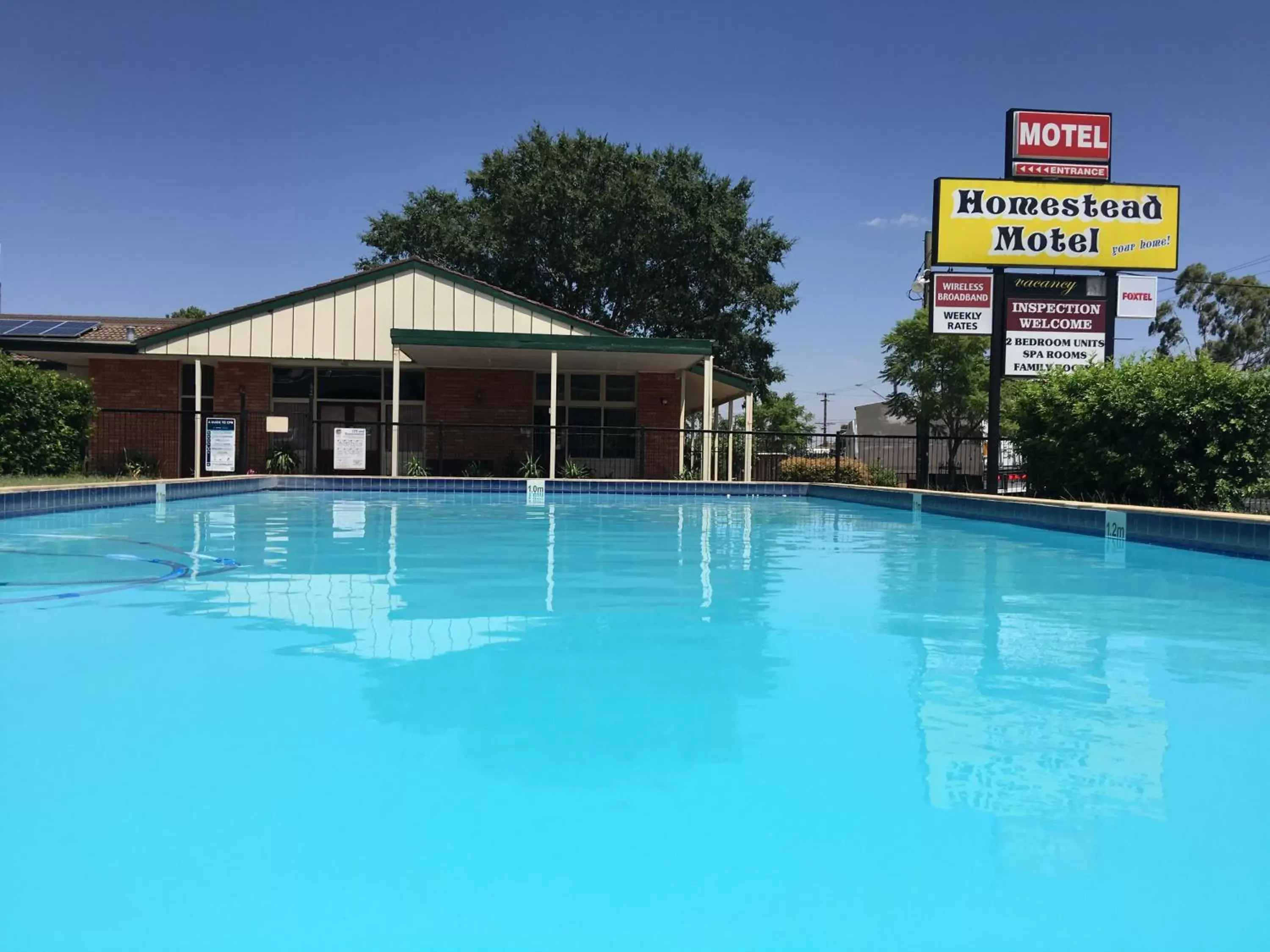 Property building, Swimming Pool in Homestead Motel