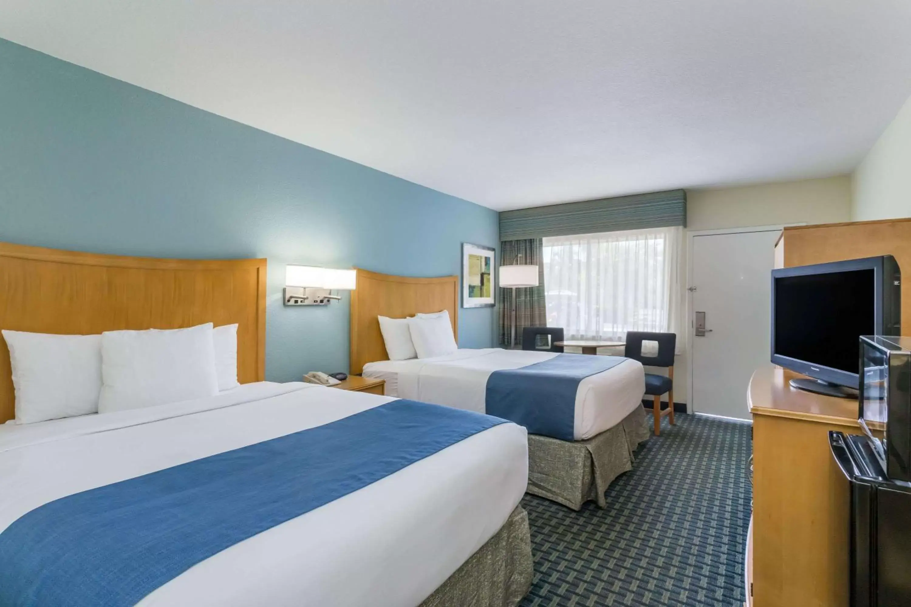 Photo of the whole room, Bed in Days Inn by Wyndham Cocoa Beach Port Canaveral