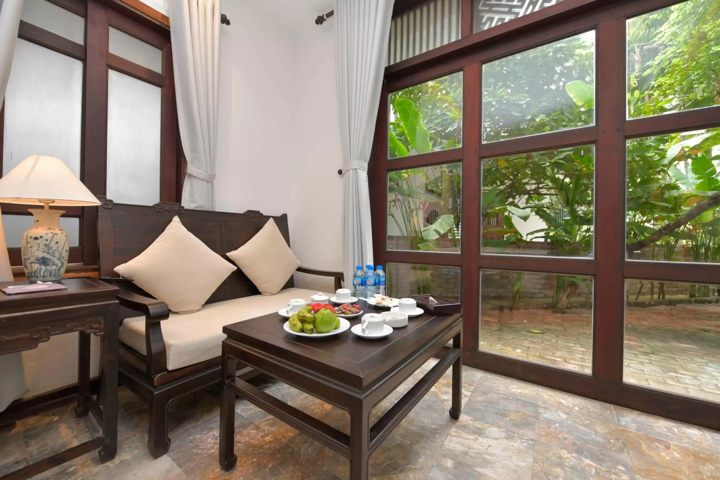 Seating area in Hoi An Ancient House Resort & Spa