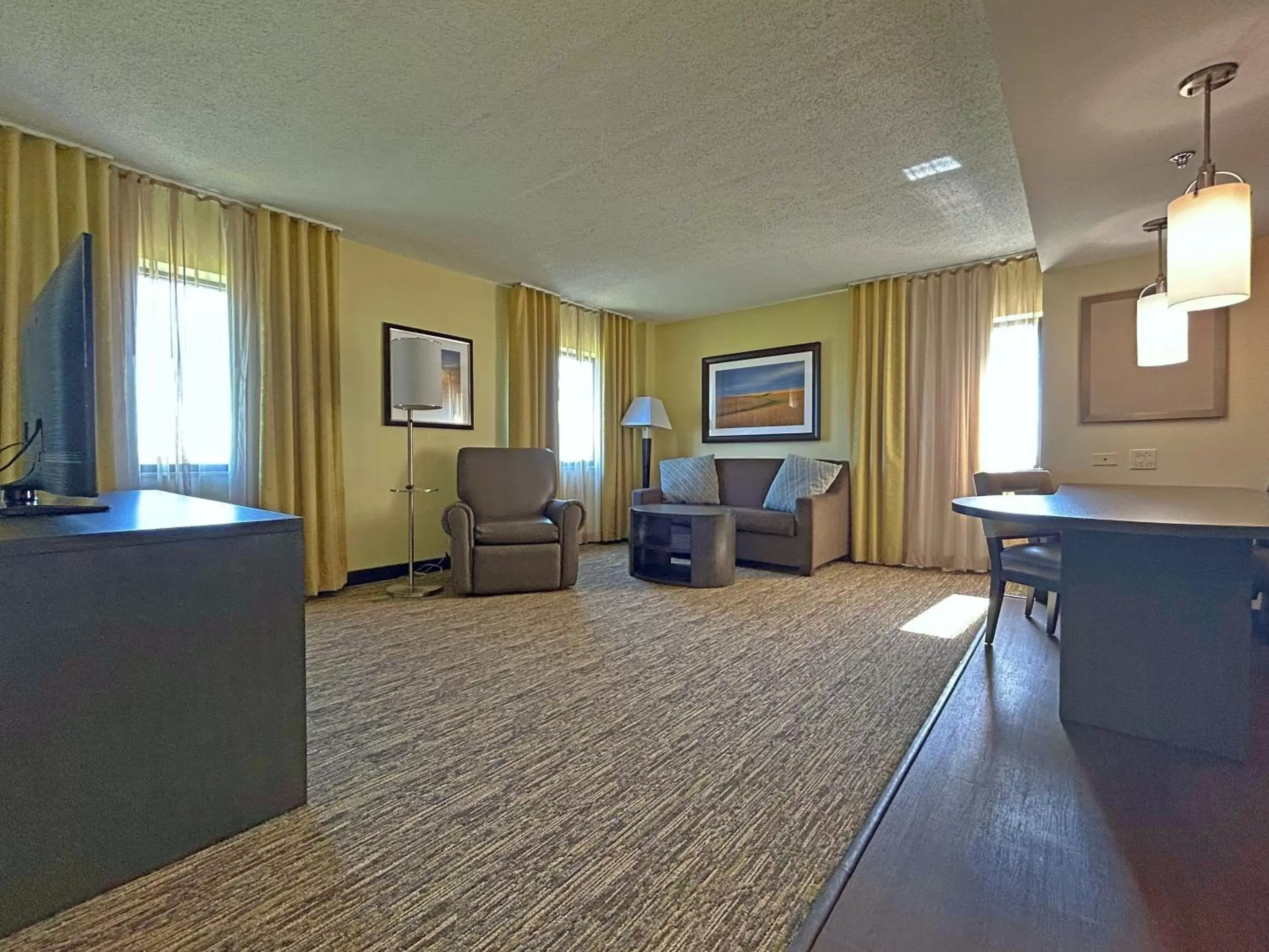 Living room, Seating Area in Candlewood Suites Indianapolis Downtown Medical District, an IHG Hotel