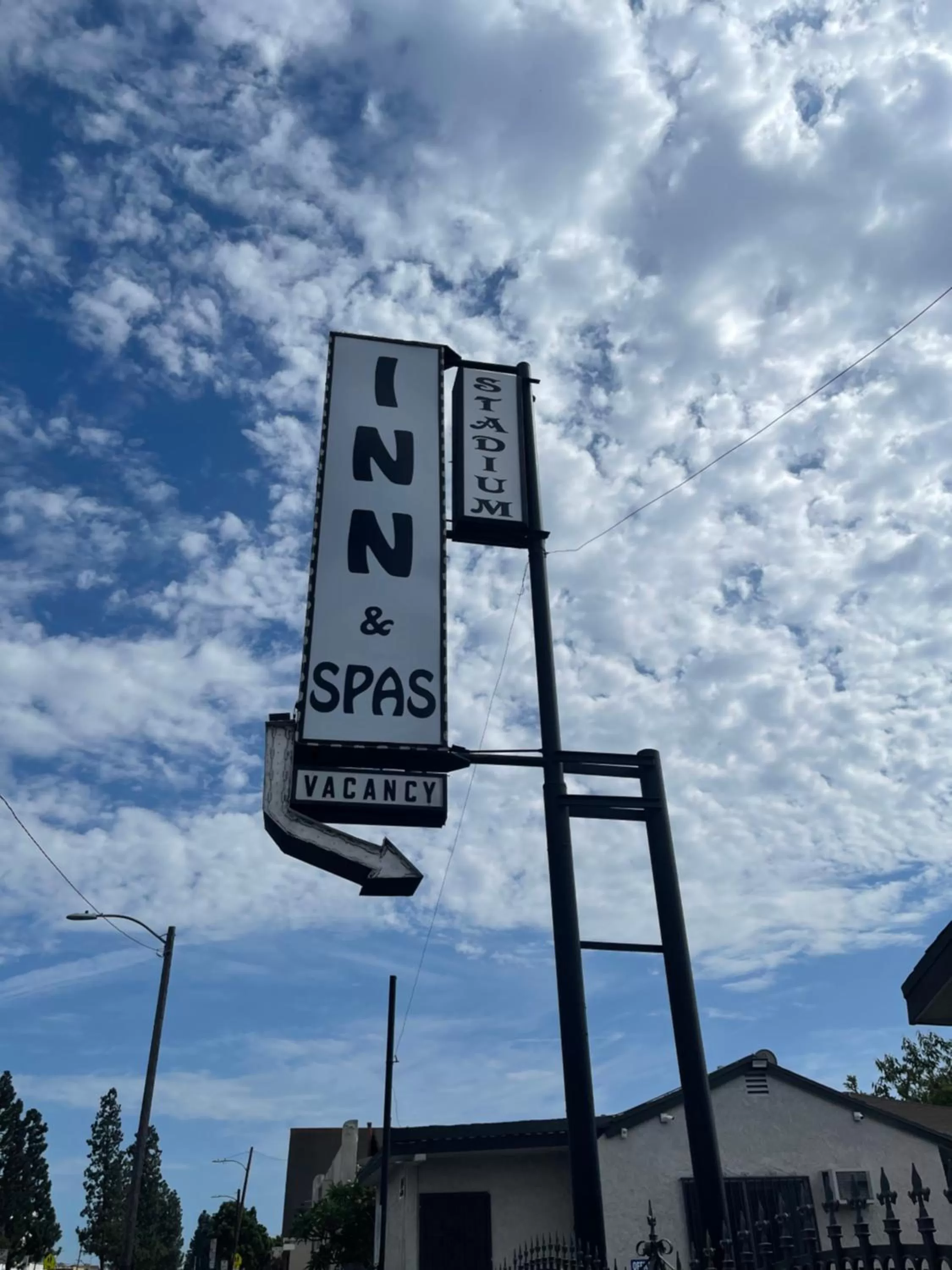 Property logo or sign in Stadium Inn & Spas