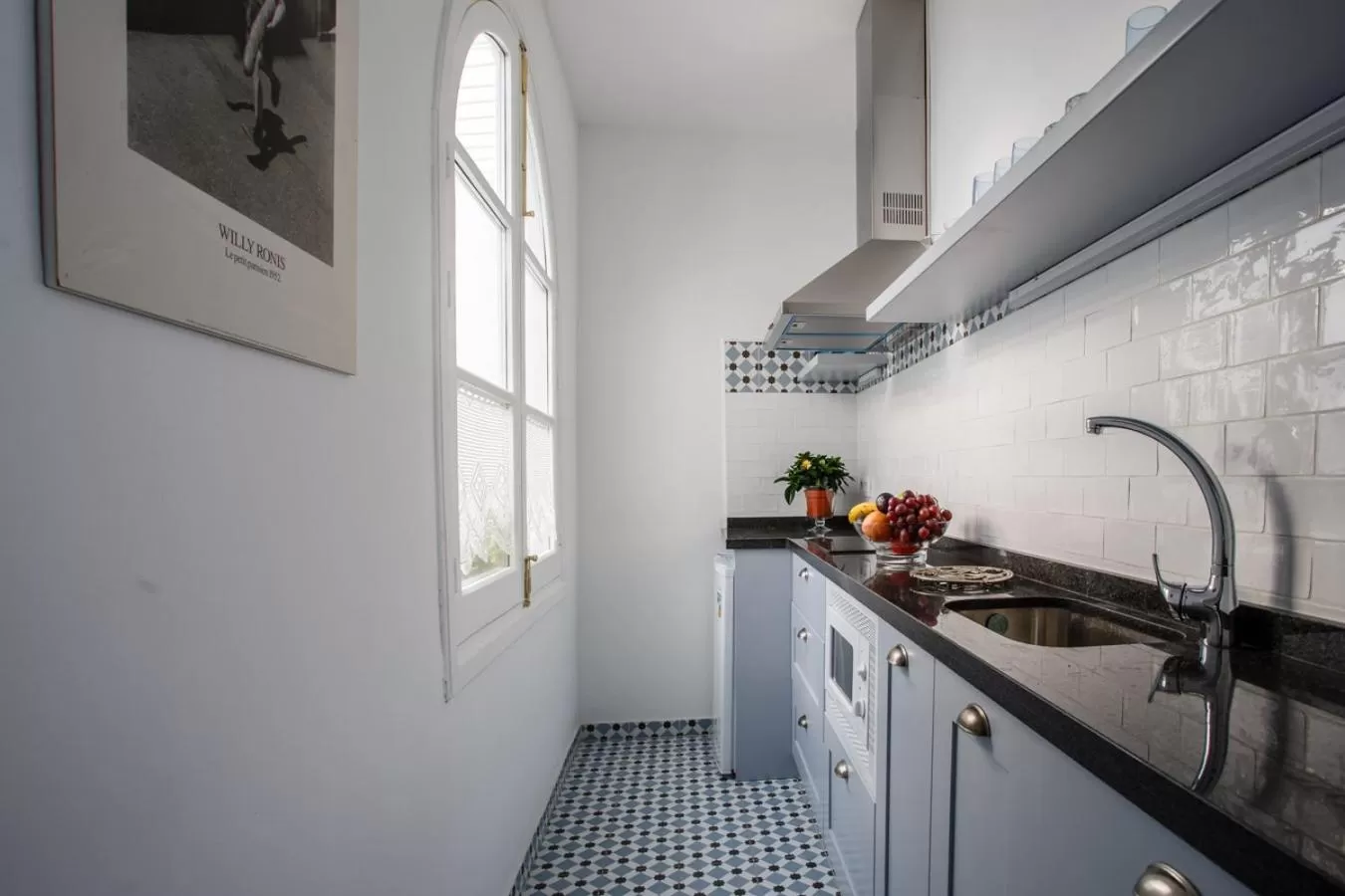 Kitchen or kitchenette in Suites Machado