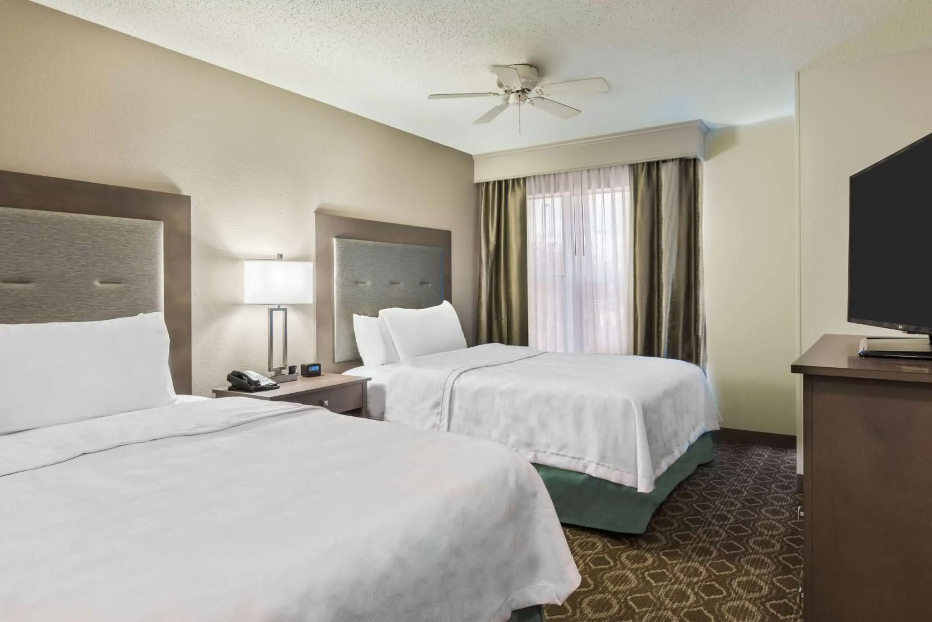 Bed in Homewood Suites by Hilton Baton Rouge