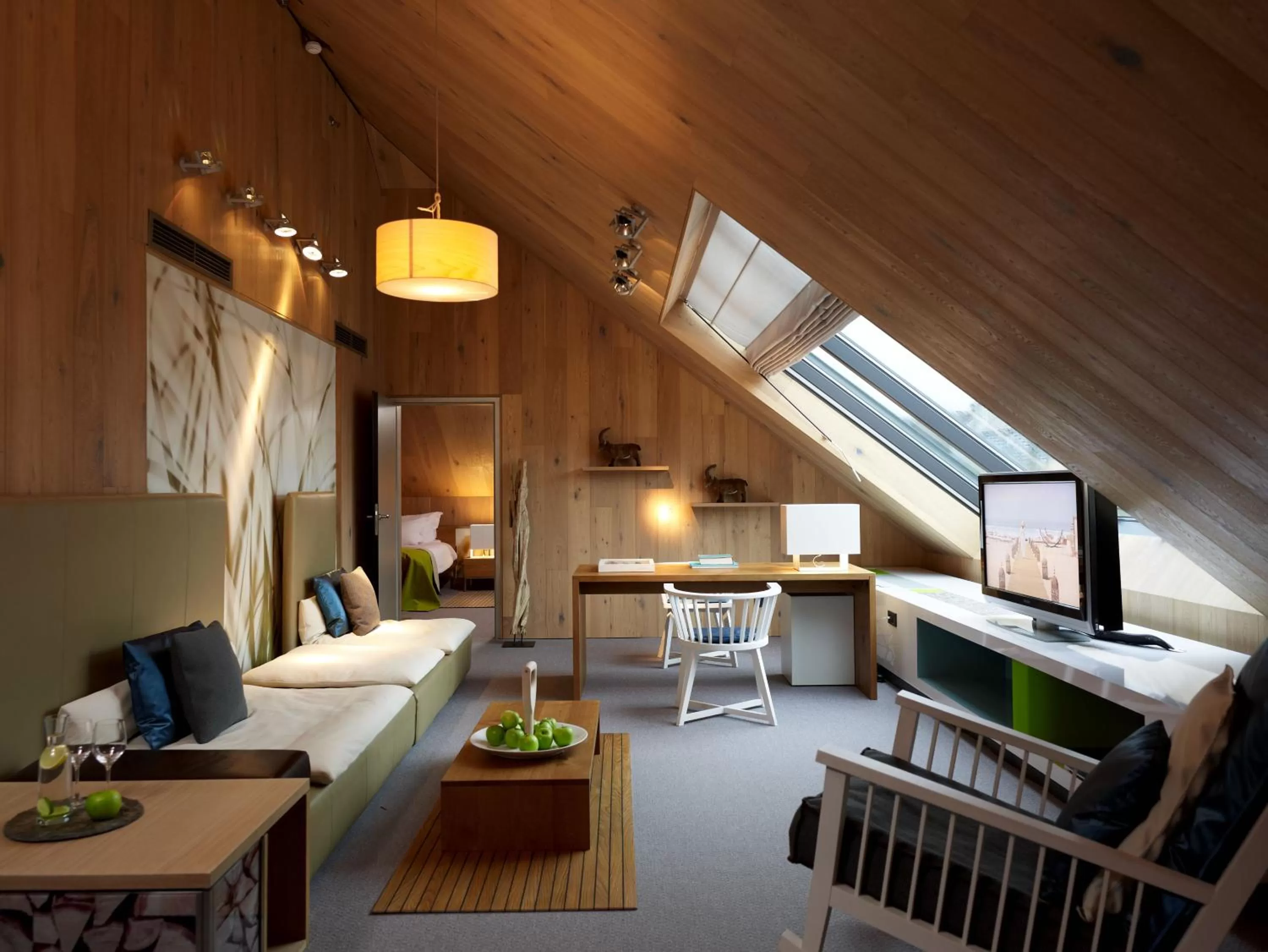 Living room, Bed in Sofitel Munich Bayerpost