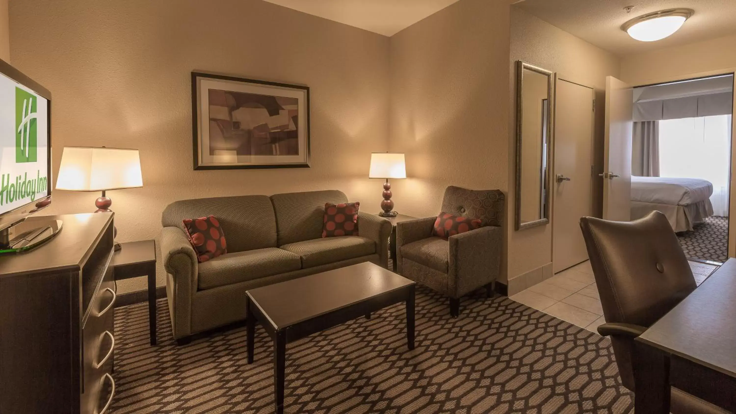 Photo of the whole room, Seating Area in Holiday Inn North Quail Springs, an IHG Hotel