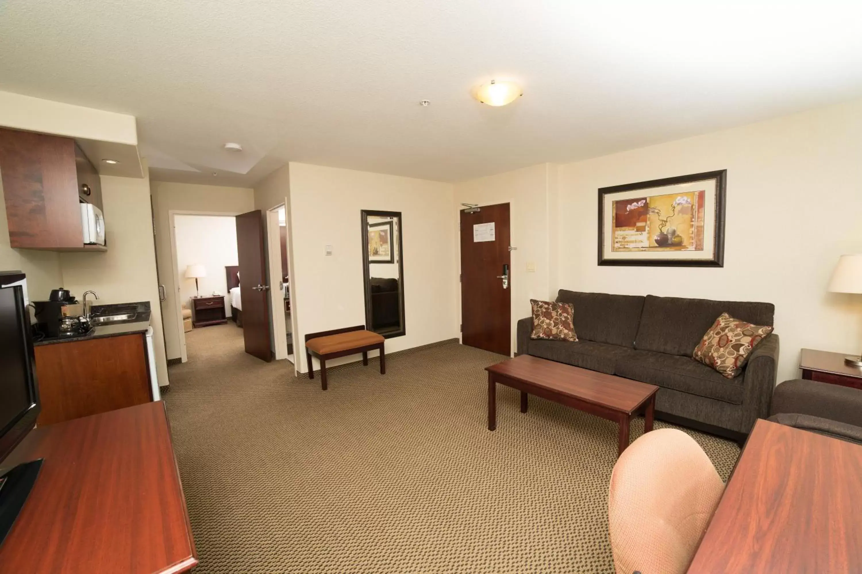 Bedroom, Seating Area in Holiday Inn & Suites Lloydminster, an IHG Hotel