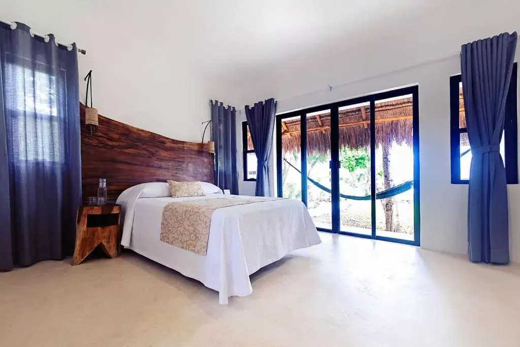 Bedroom, Bed in Mi Kasa Tu Kasa Bacalar by Nah Hotels