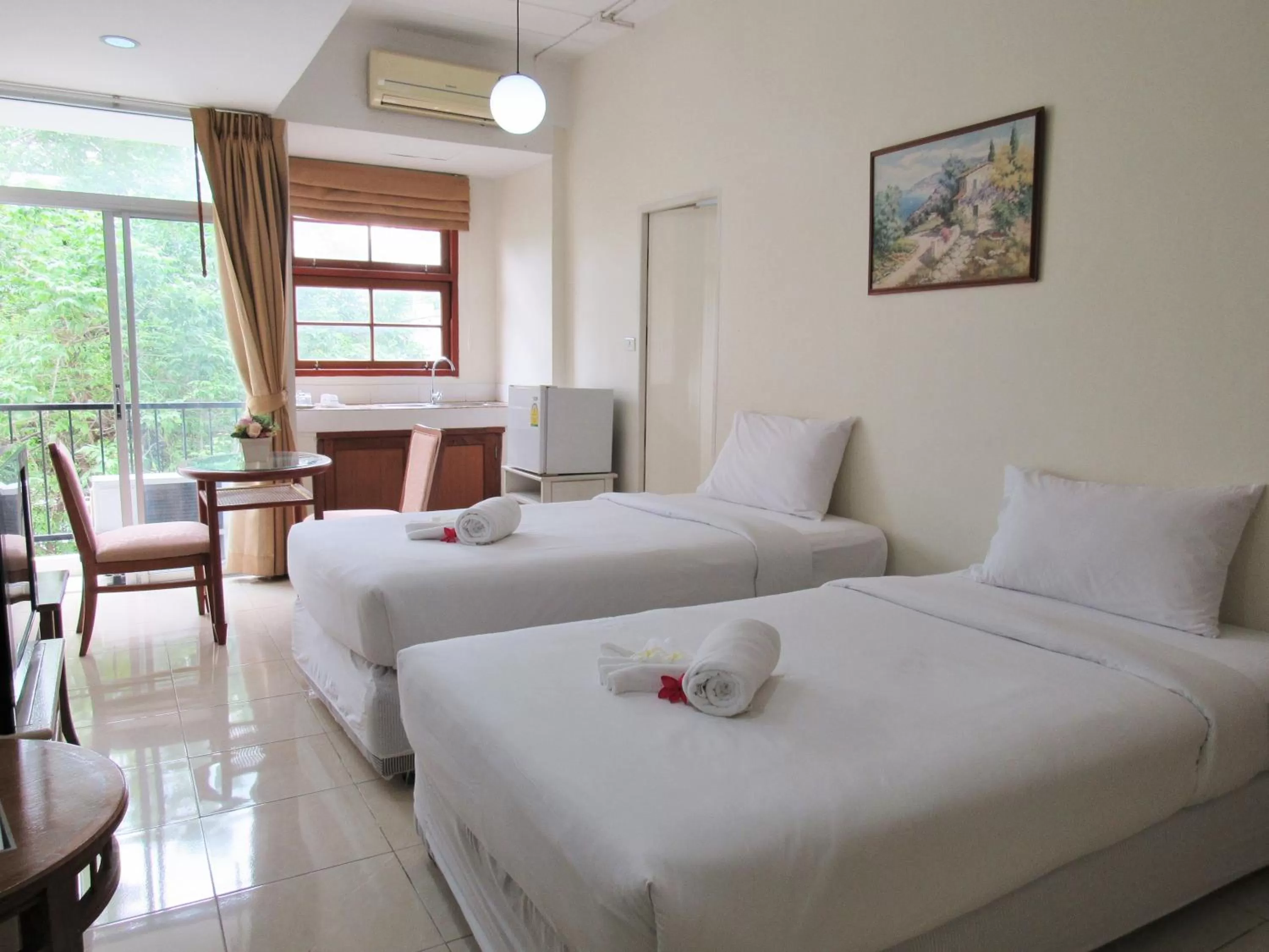 Bed in JL Bangkok Hotel