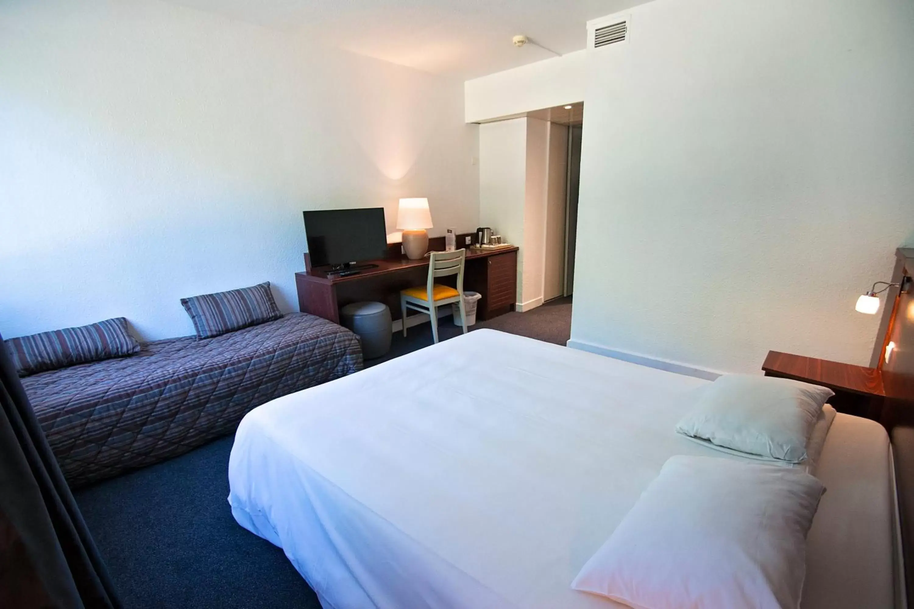 Bed in Kyriad Nemours Bed in Kyriad Nemours