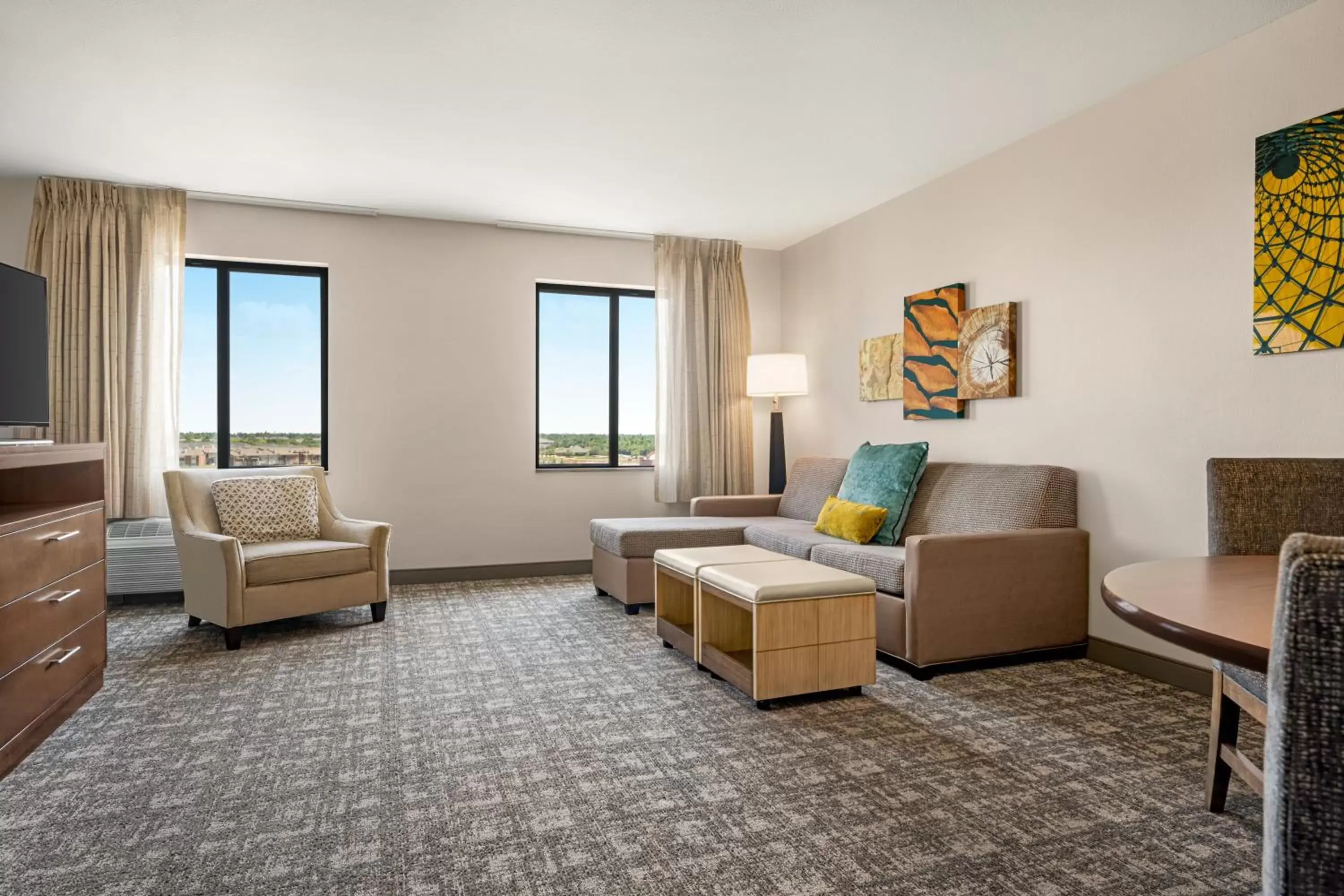 Living room, Seating Area in Staybridge Suites Oklahoma City-Quail Springs, an IHG Hotel