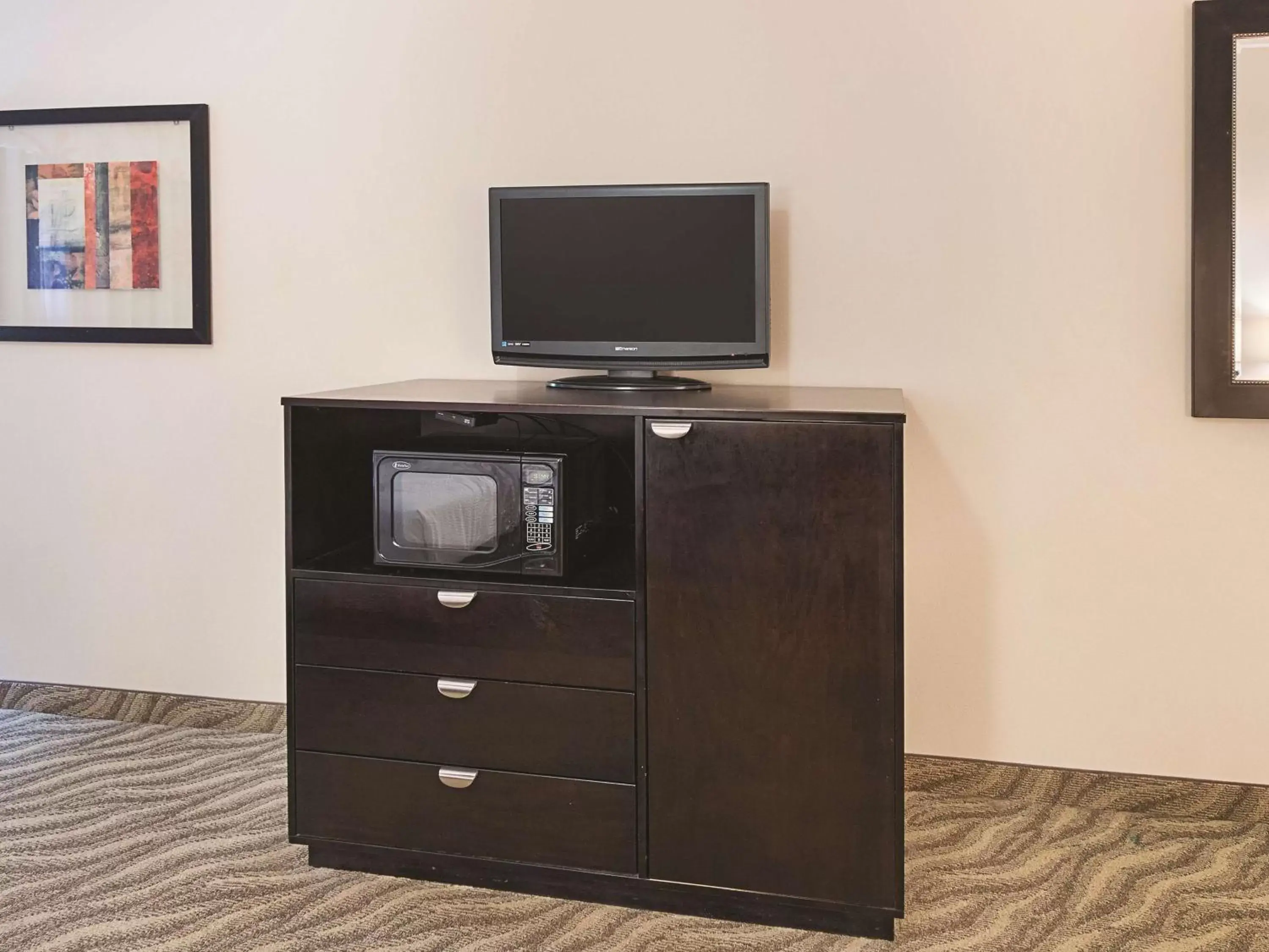 Photo of the whole room, TV/Entertainment Center in La Quinta by Wyndham Glen Rose