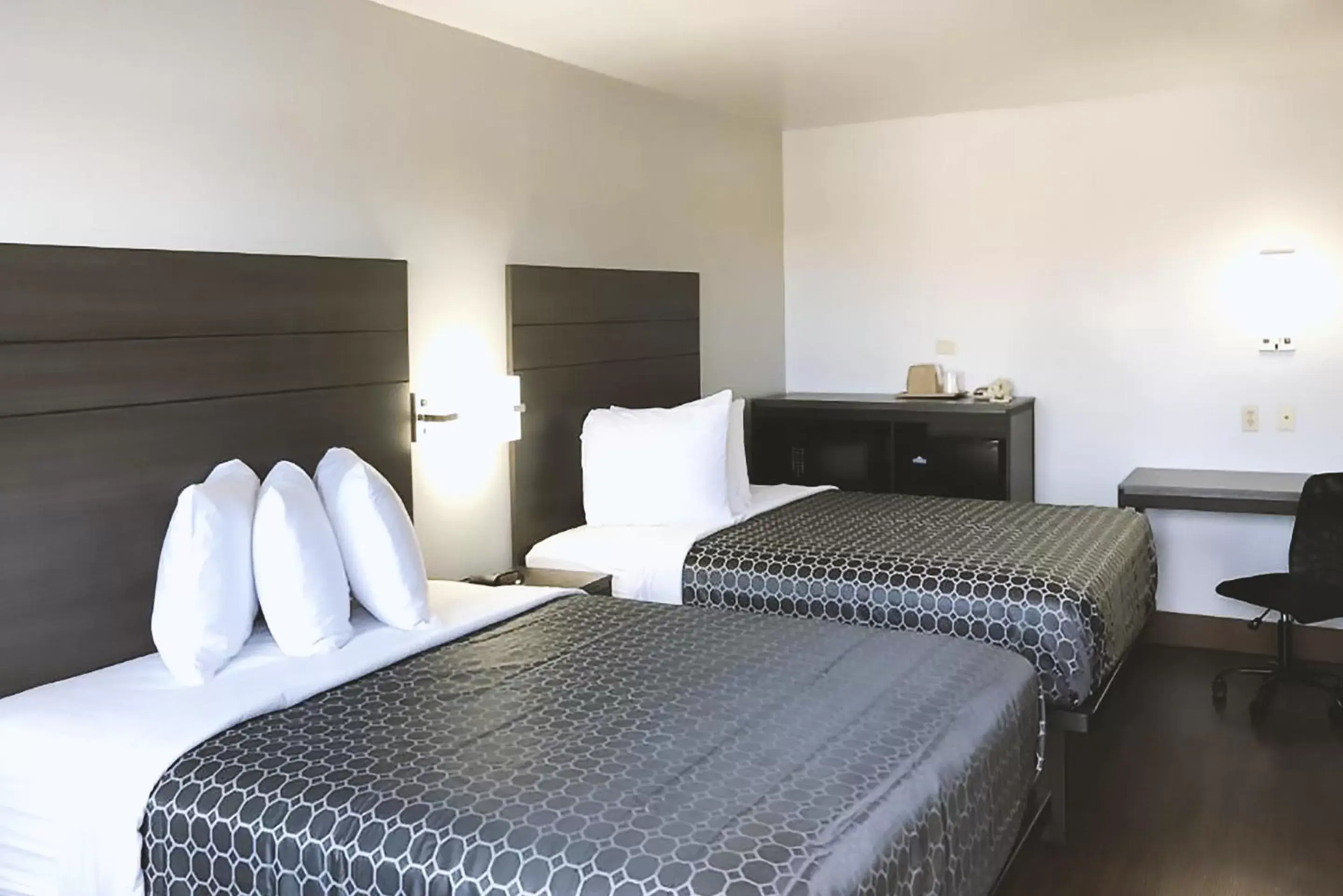 Bedroom, Bed in Blue Way Inn By Jasper Near Frost Bank Center Bedroom, Bed in Blue Way Inn By Jasper Near Frost Bank Center