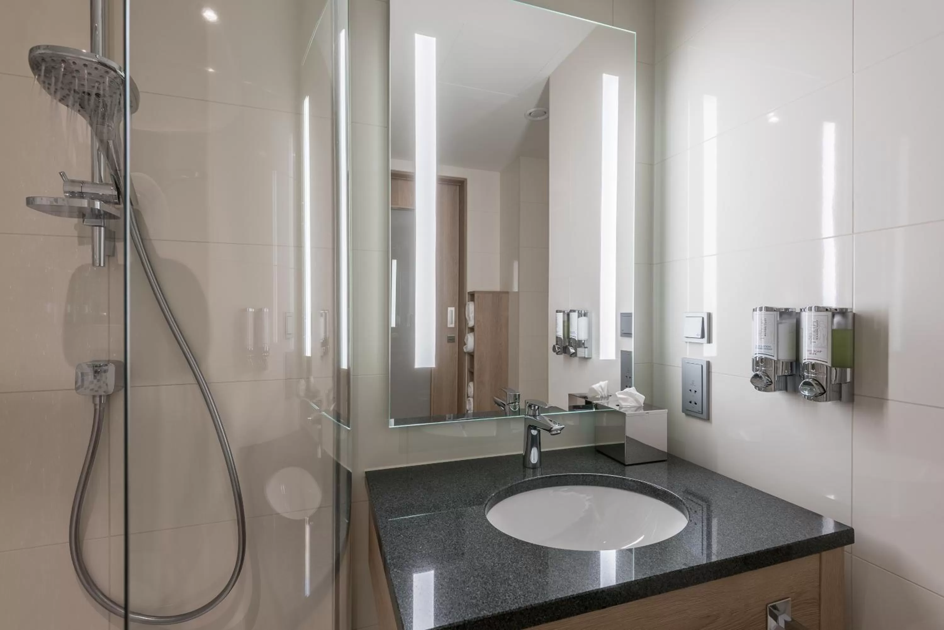 Shower in Hampton By Hilton Freiburg