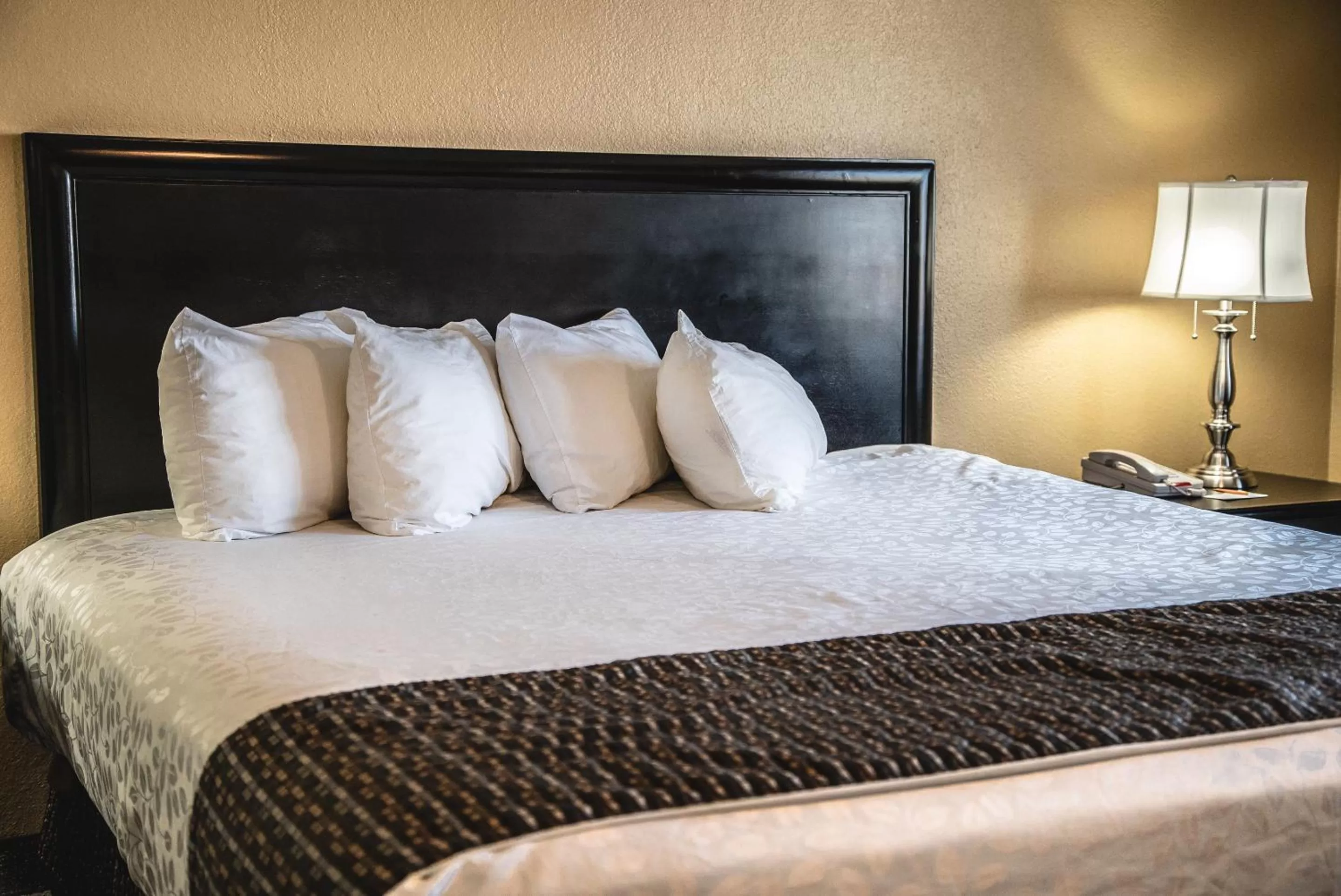 Bed in The Stone Castle Hotel & Conference Center