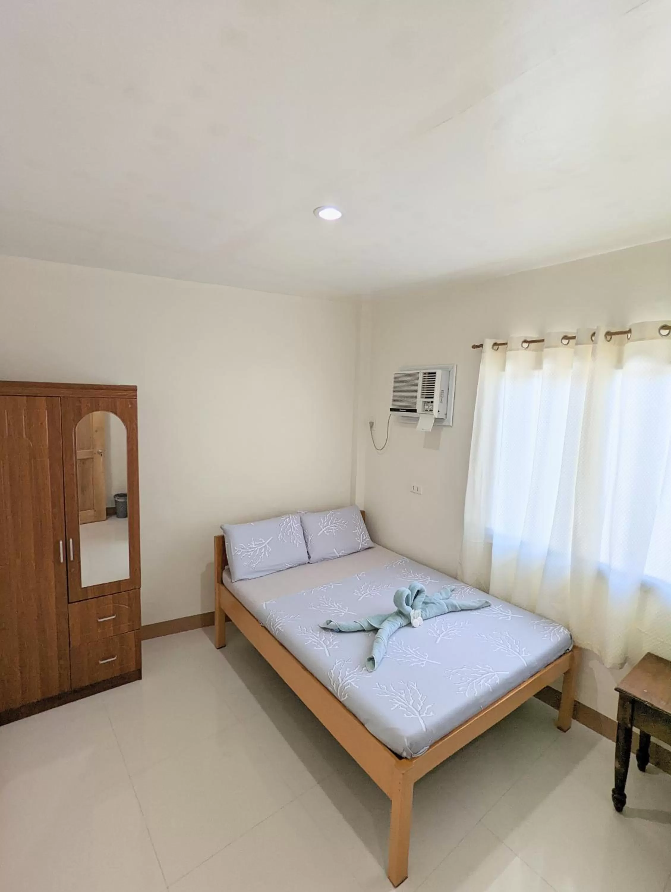 Bed in Charlina Inn Panglao