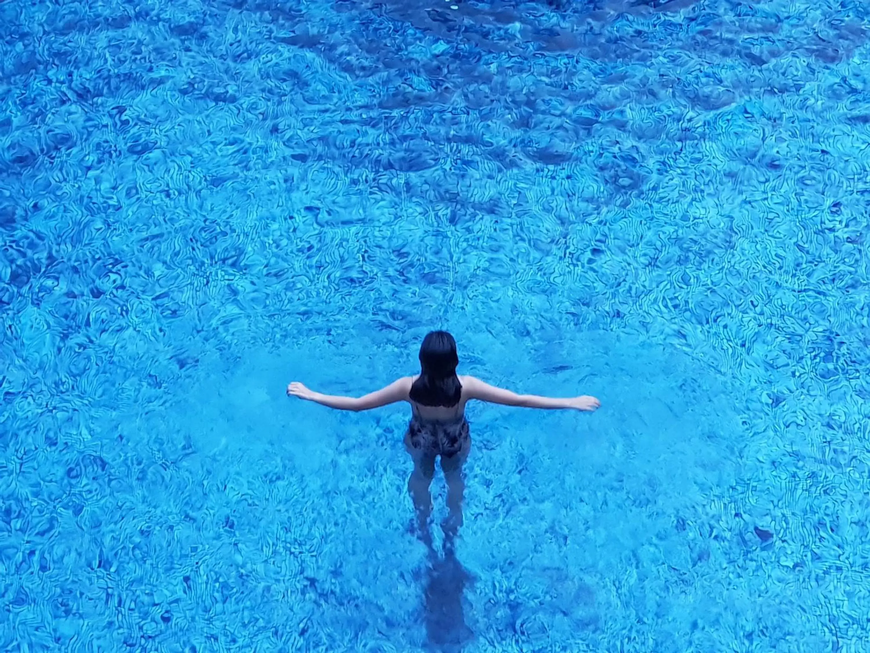 Text overlay, Swimming Pool in A Rock Resort Langkawi - Coral Reefs