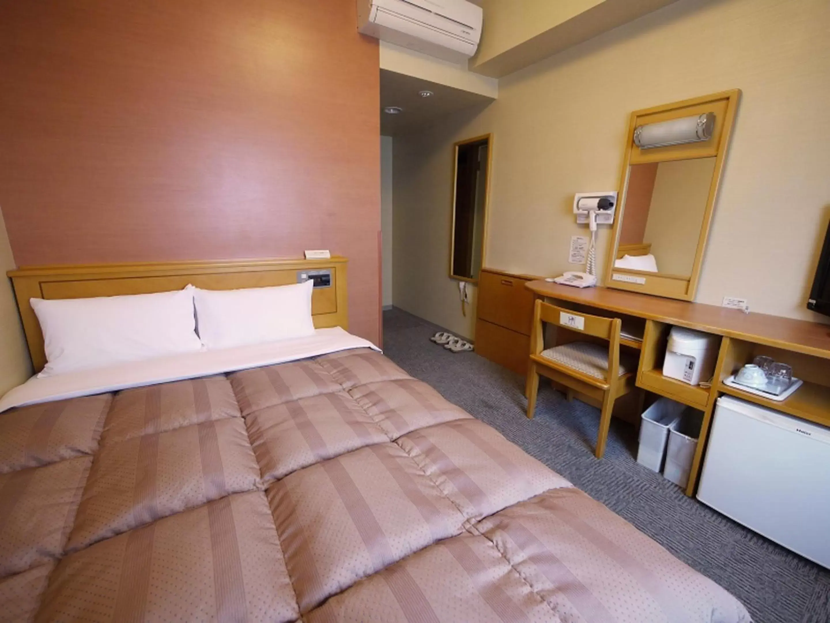 Bed in Hotel Route-Inn Yamagata Ekimae