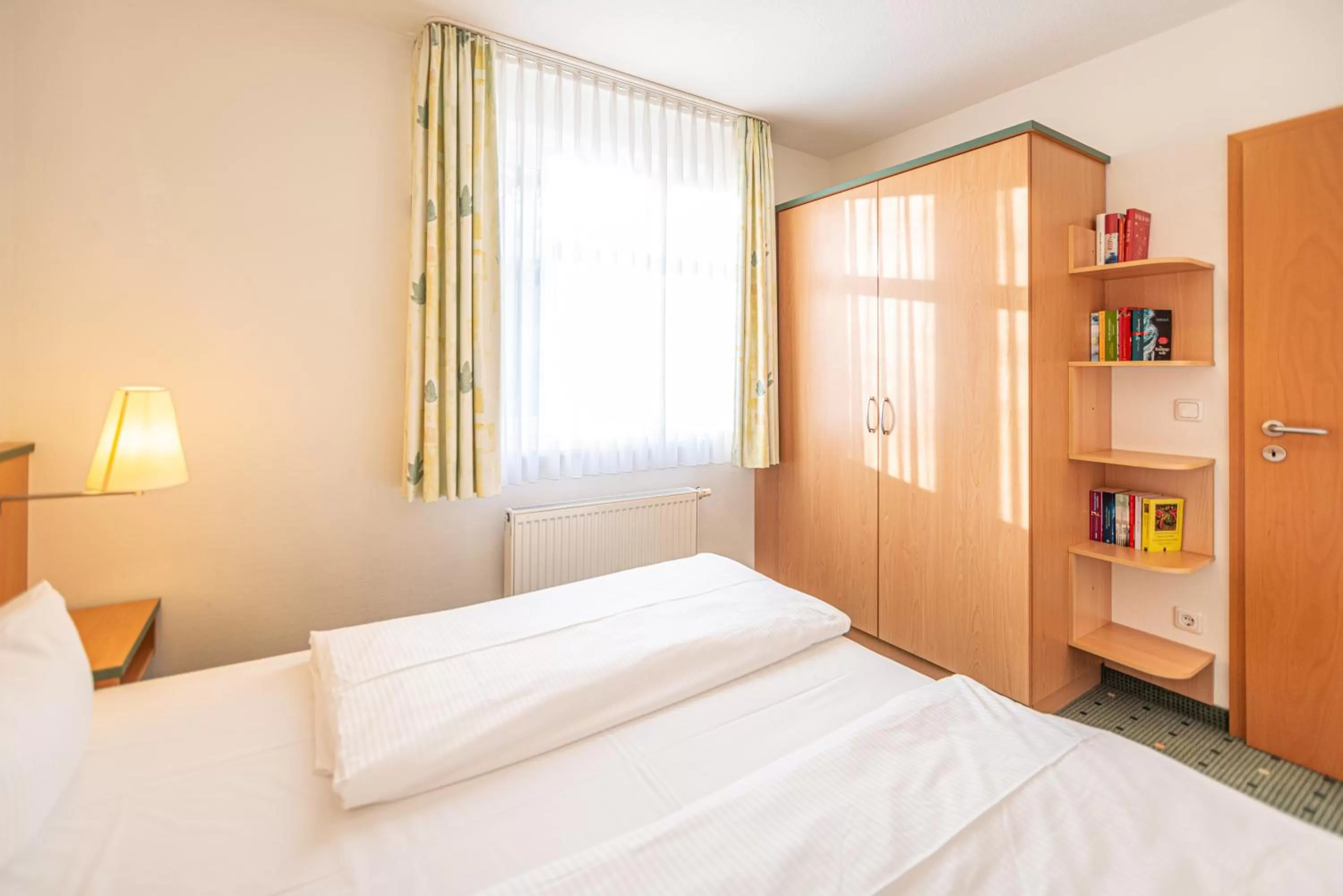 Photo of the whole room, Bed in Am Weststrand Apartmenthaus Waldeck