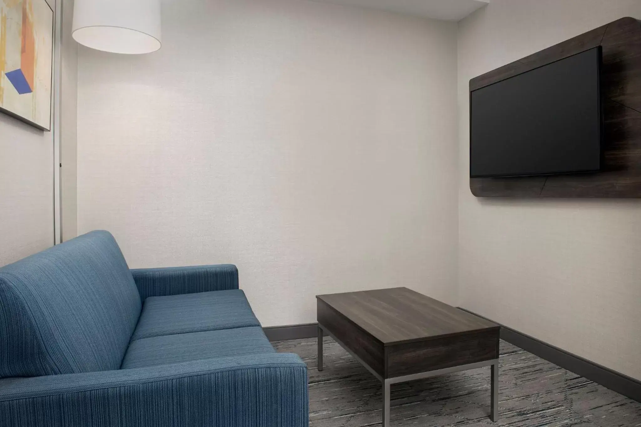 Photo of the whole room, TV/Entertainment Center in Holiday Inn Express Hotel & Suites Knoxville-Clinton, an IHG Hotel