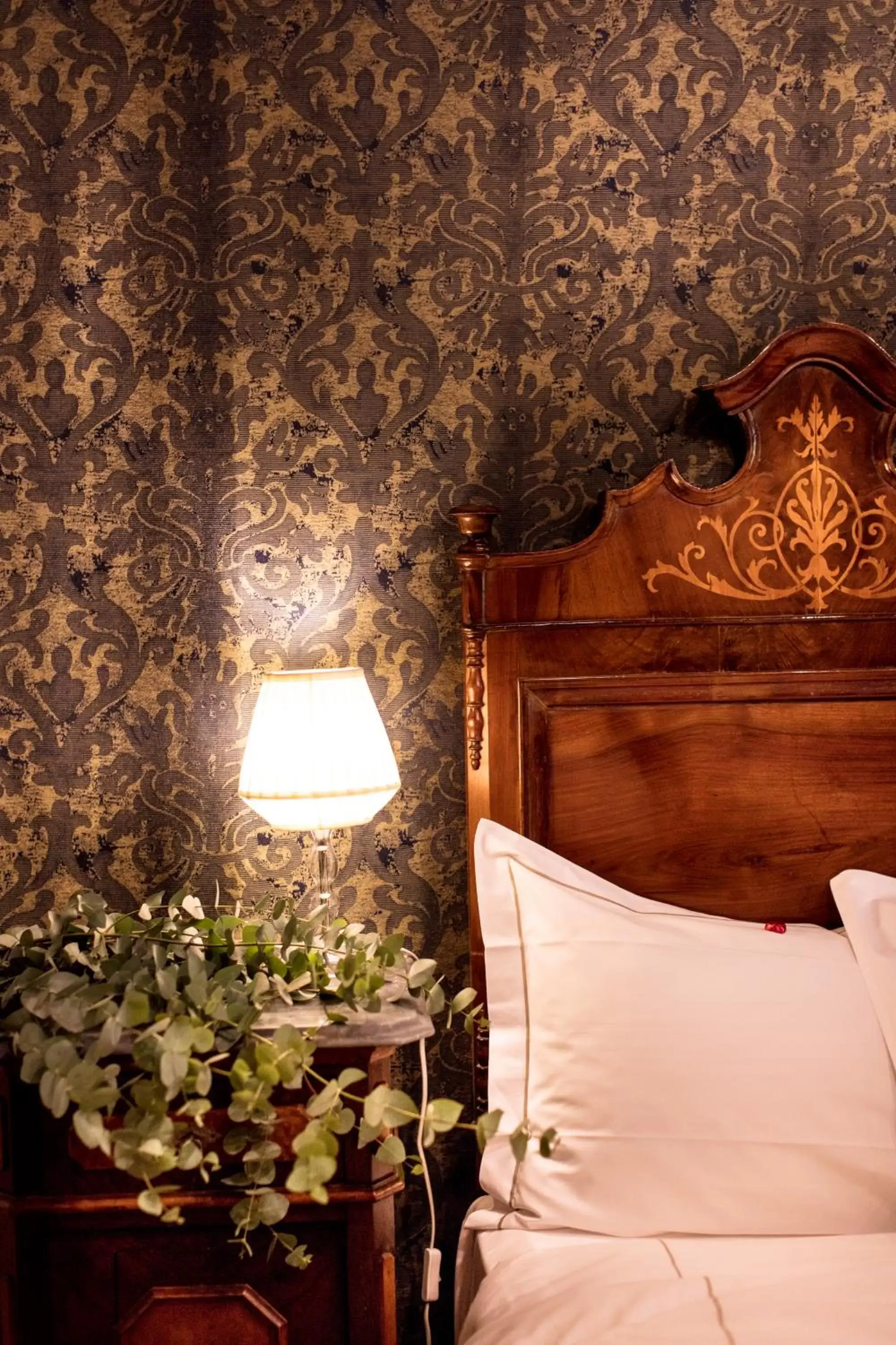 Decorative detail, Bed in Novecento Boutique Hotel