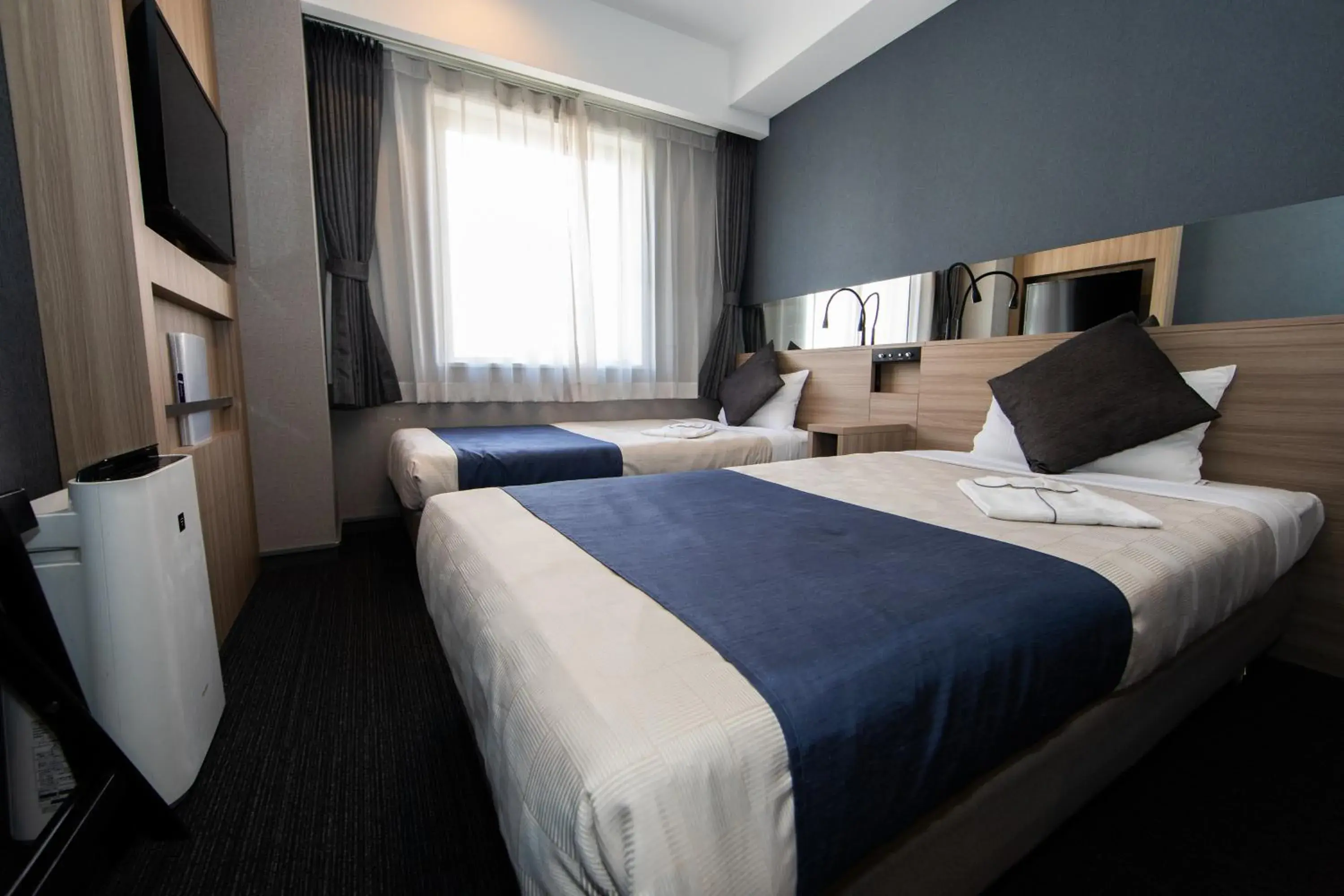 Photo of the whole room, Bed in Quintessa Hotel Osaka Shinsaibashi Comic & Books Photo of the whole room, Bed in Quintessa Hotel Osaka Shinsaibashi Comic & Books