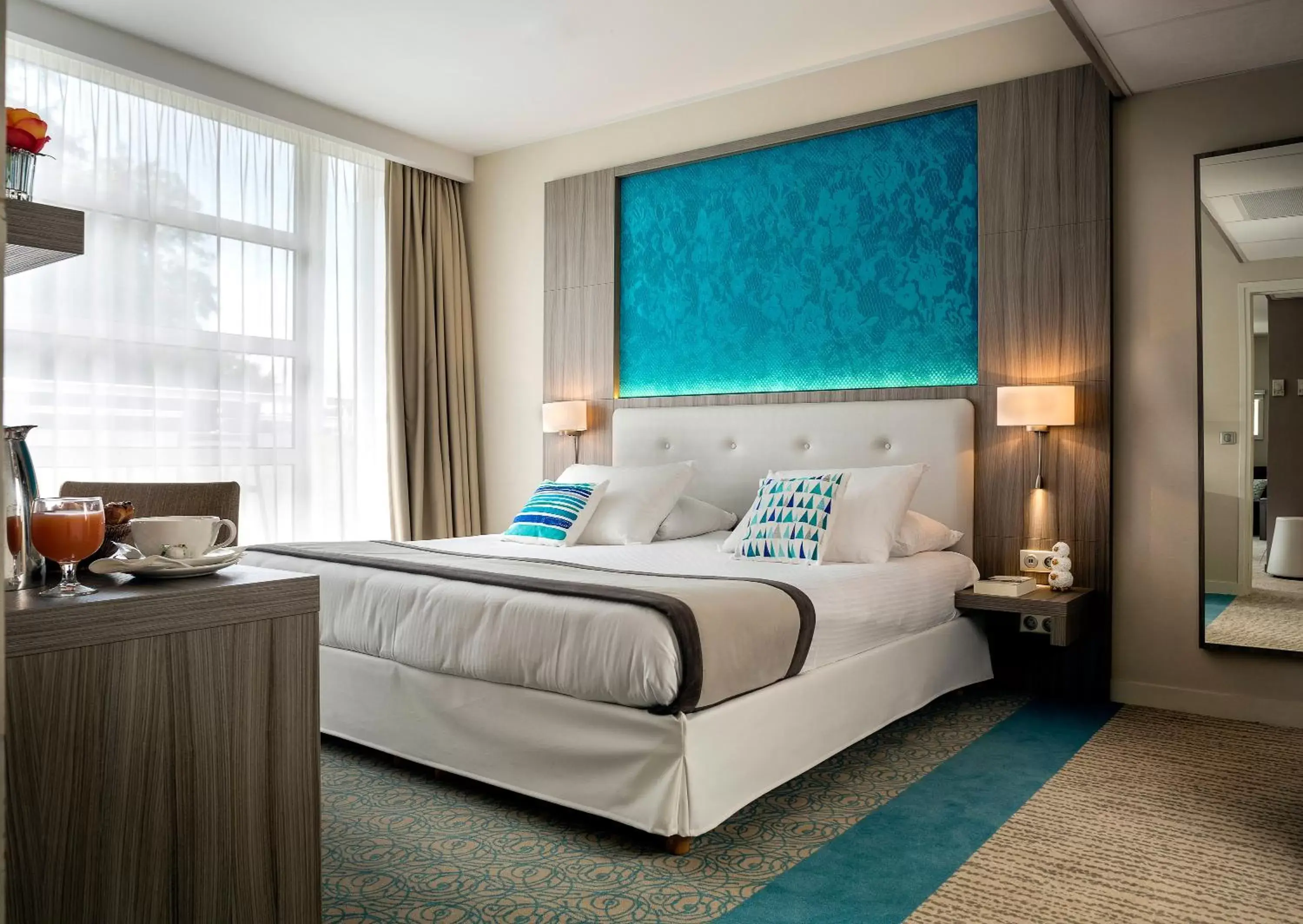 Bedroom, Bed in Golden Tulip Aix les Bains - Hotel & Spa