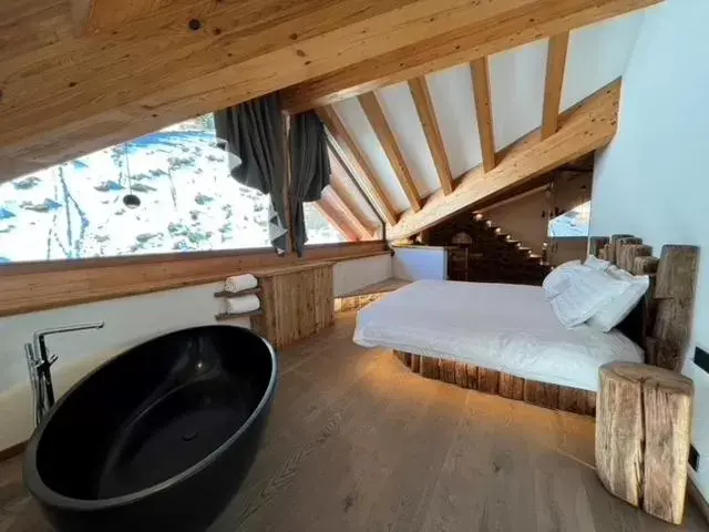 Bed in Hotel Chalet Al Foss