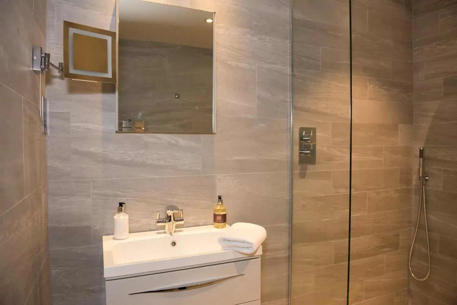 Bathroom in Roundthorn Country House & Luxury Apartments
