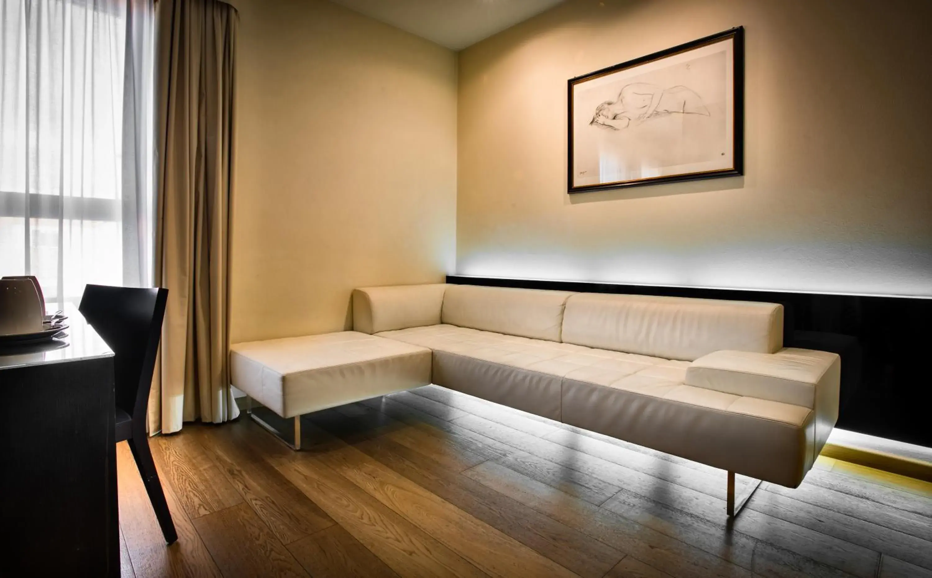 Bedroom, Seating Area in Sardegna Hotel - Suites & Restaurant