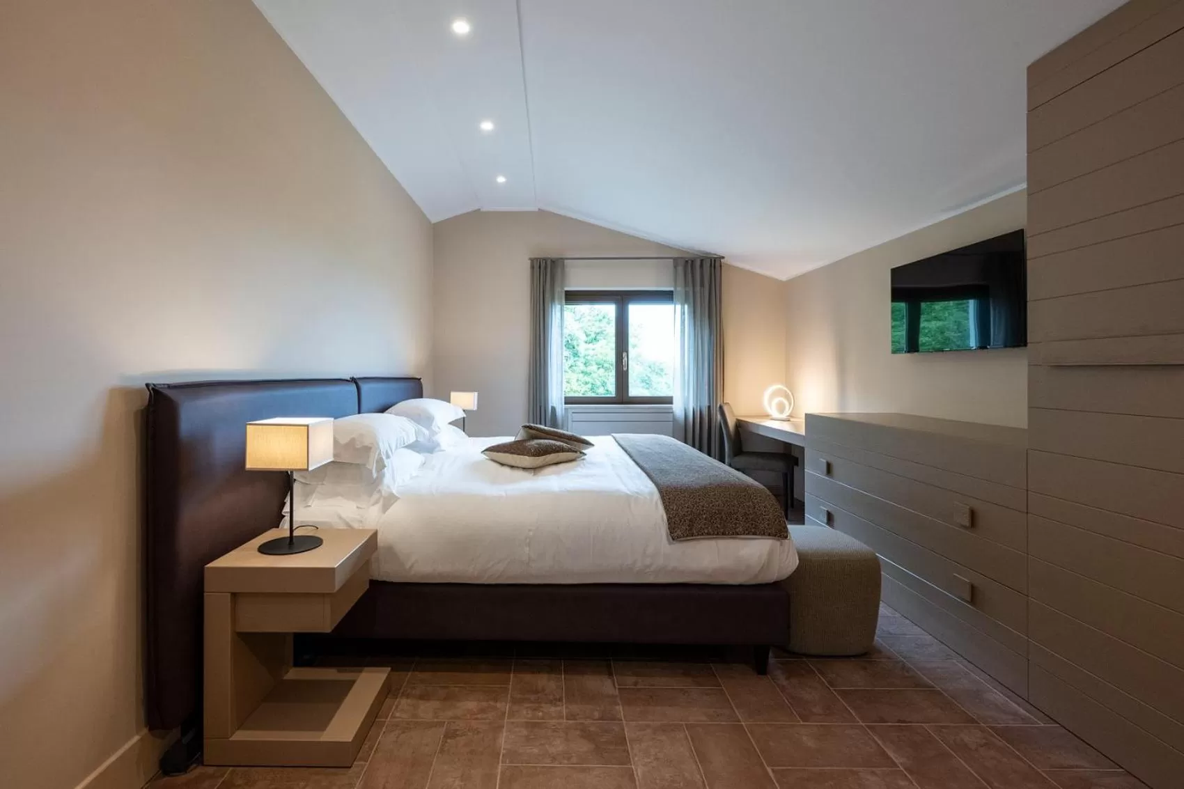 Photo of the whole room, Bed in Altarocca Wine Resort Adults Only