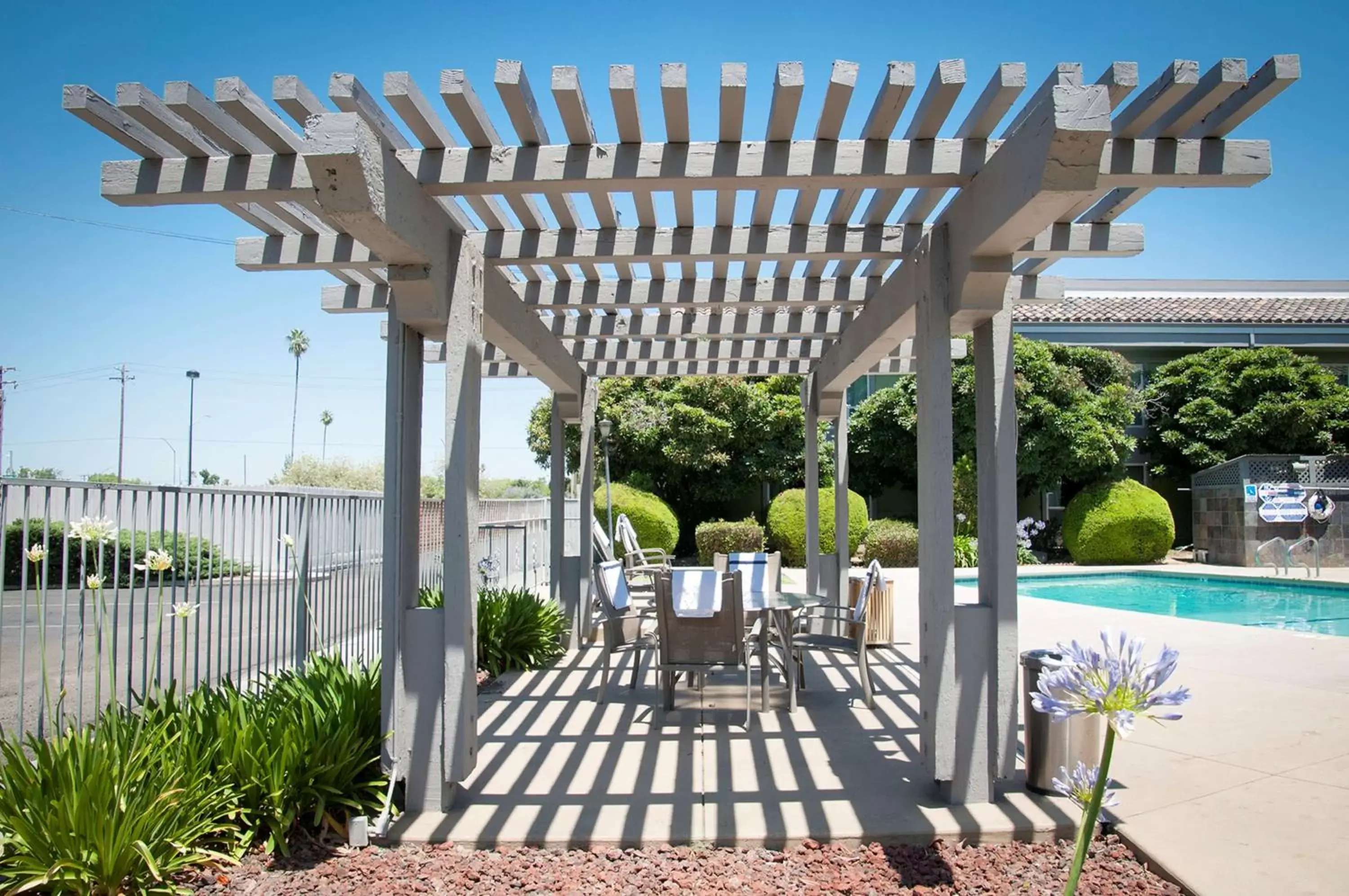 Patio, Swimming Pool in Best Western Village Inn