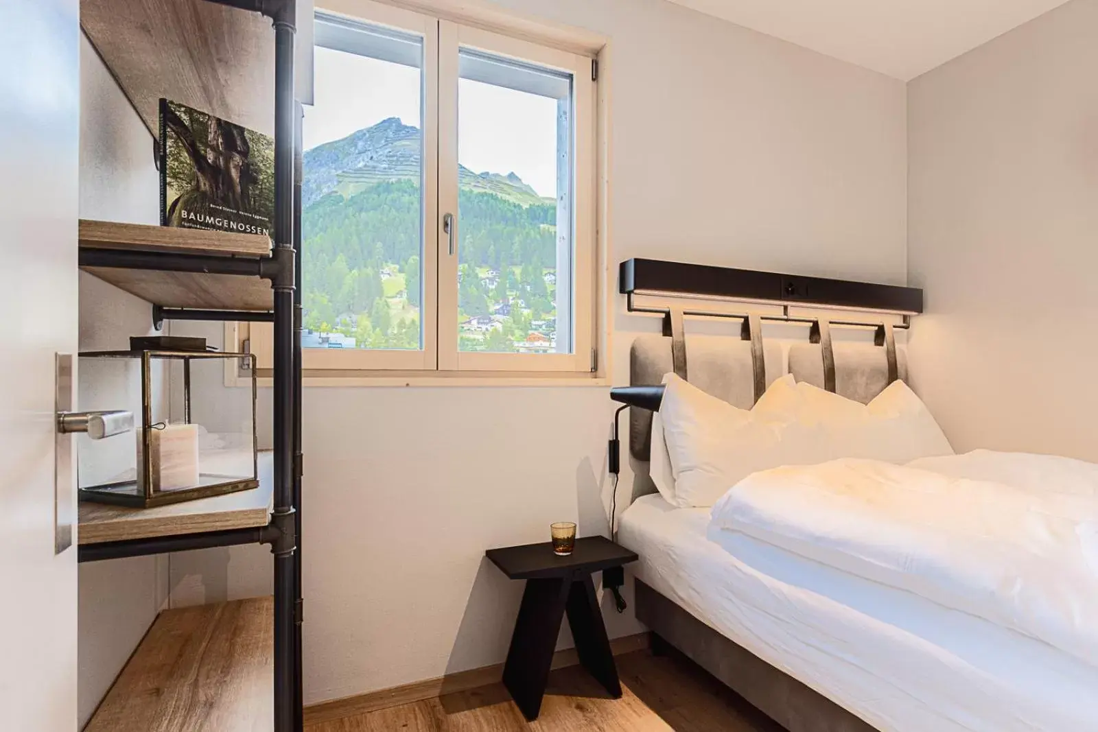 Bedroom in ALPINE INN Davos