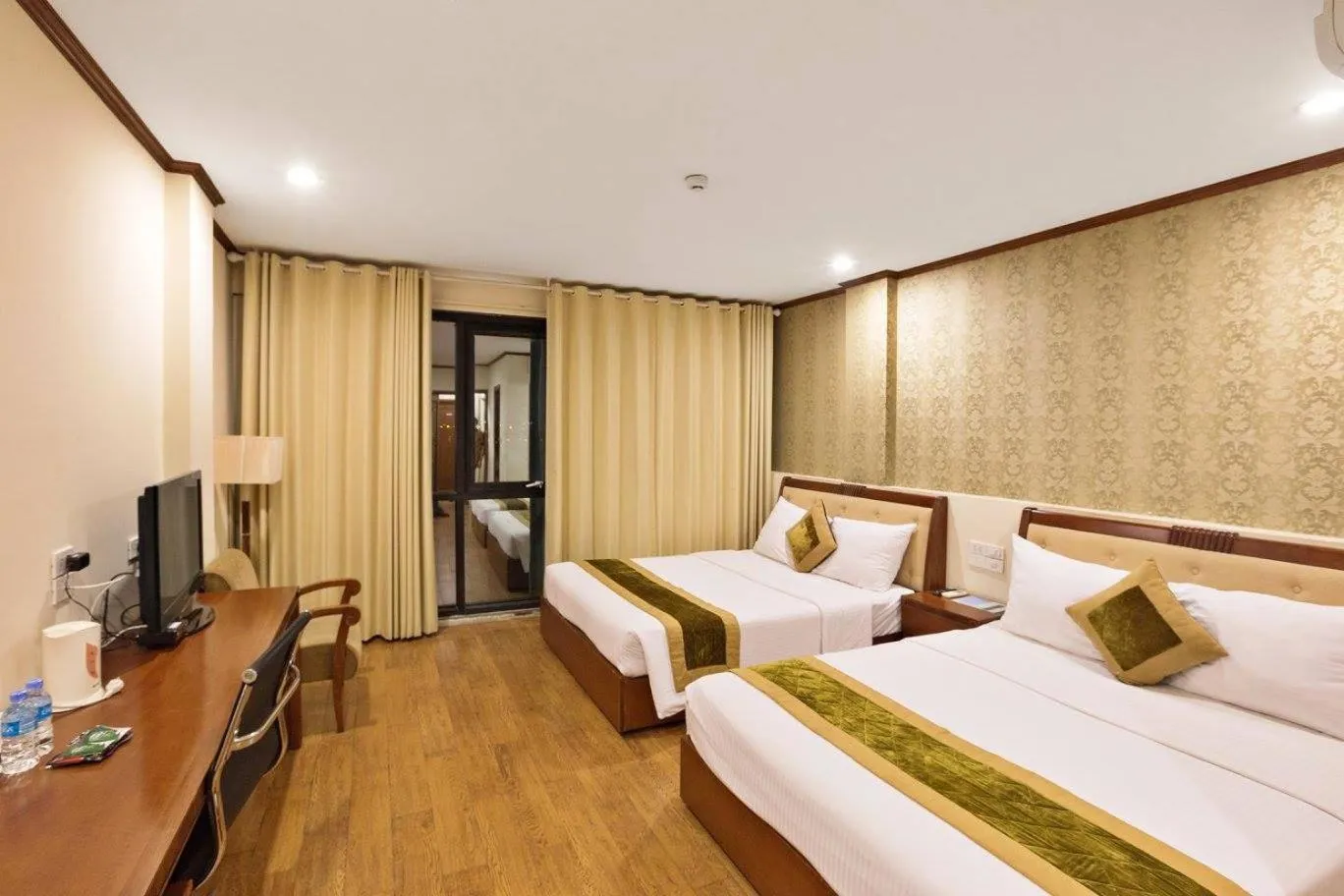 Bed in Sunset Westlake Hanoi Hotel