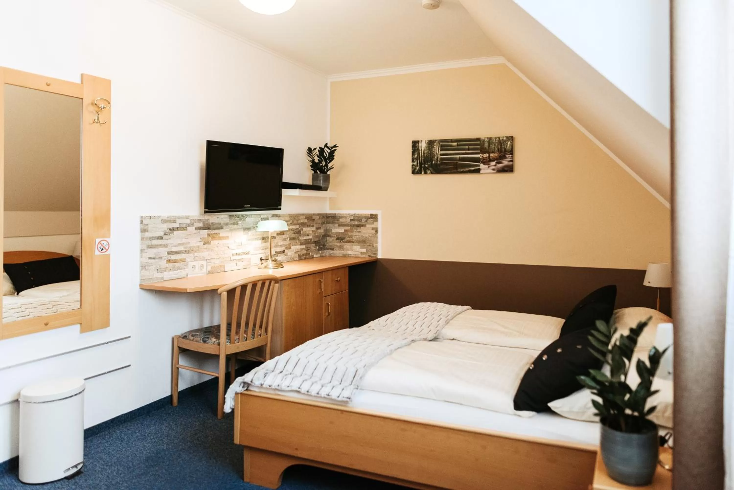 Bed in Restaurant Gästehaus Feldkirchen