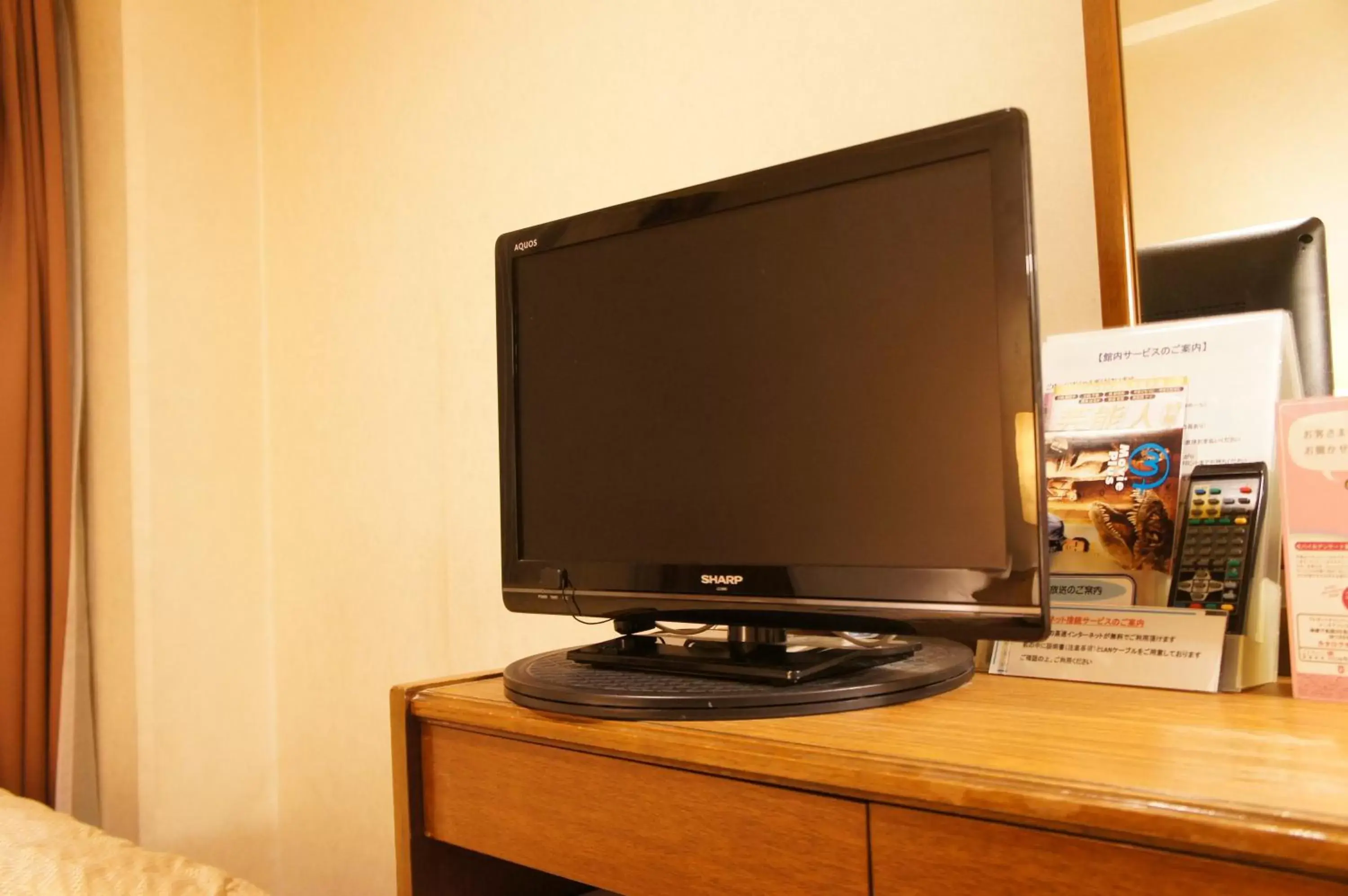 TV and multimedia, TV/Entertainment Center in Hotel Sunroute Matsuyama