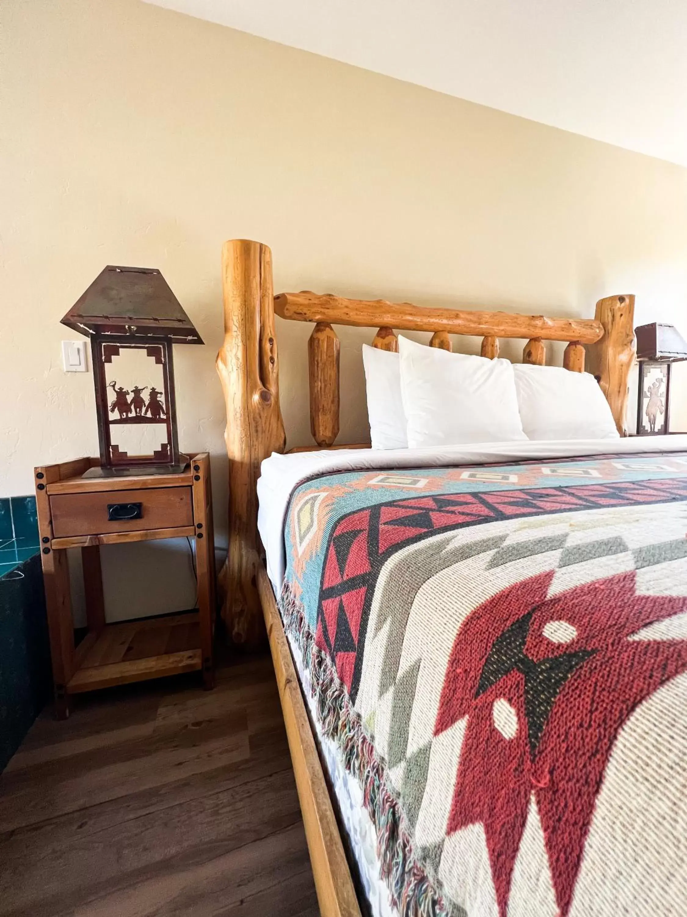 Bed in Creekside Lodge and Cabins